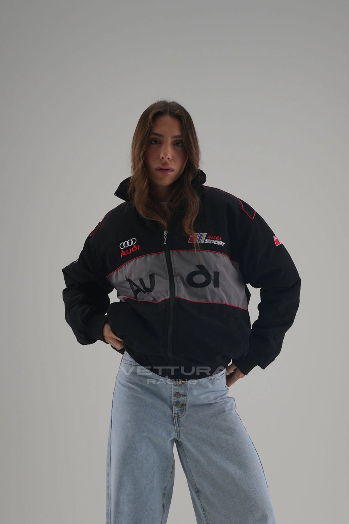 Woman wearing the black Audi vintage racing bomber jacket