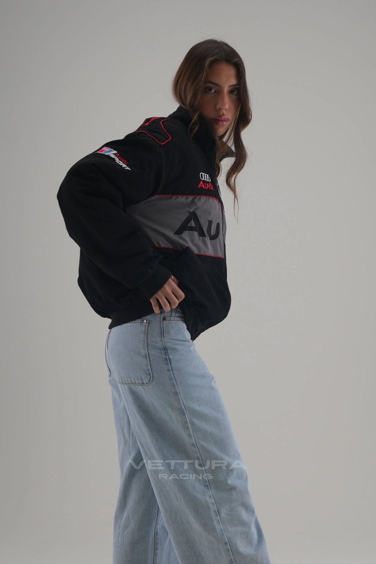 Side view of the Audi vintage racing jacket showing the embroidered sleeve