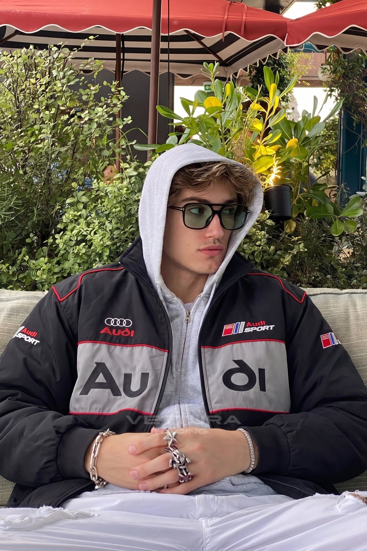Lifestyle shot wearing the Audi vintage racing bomber jacket