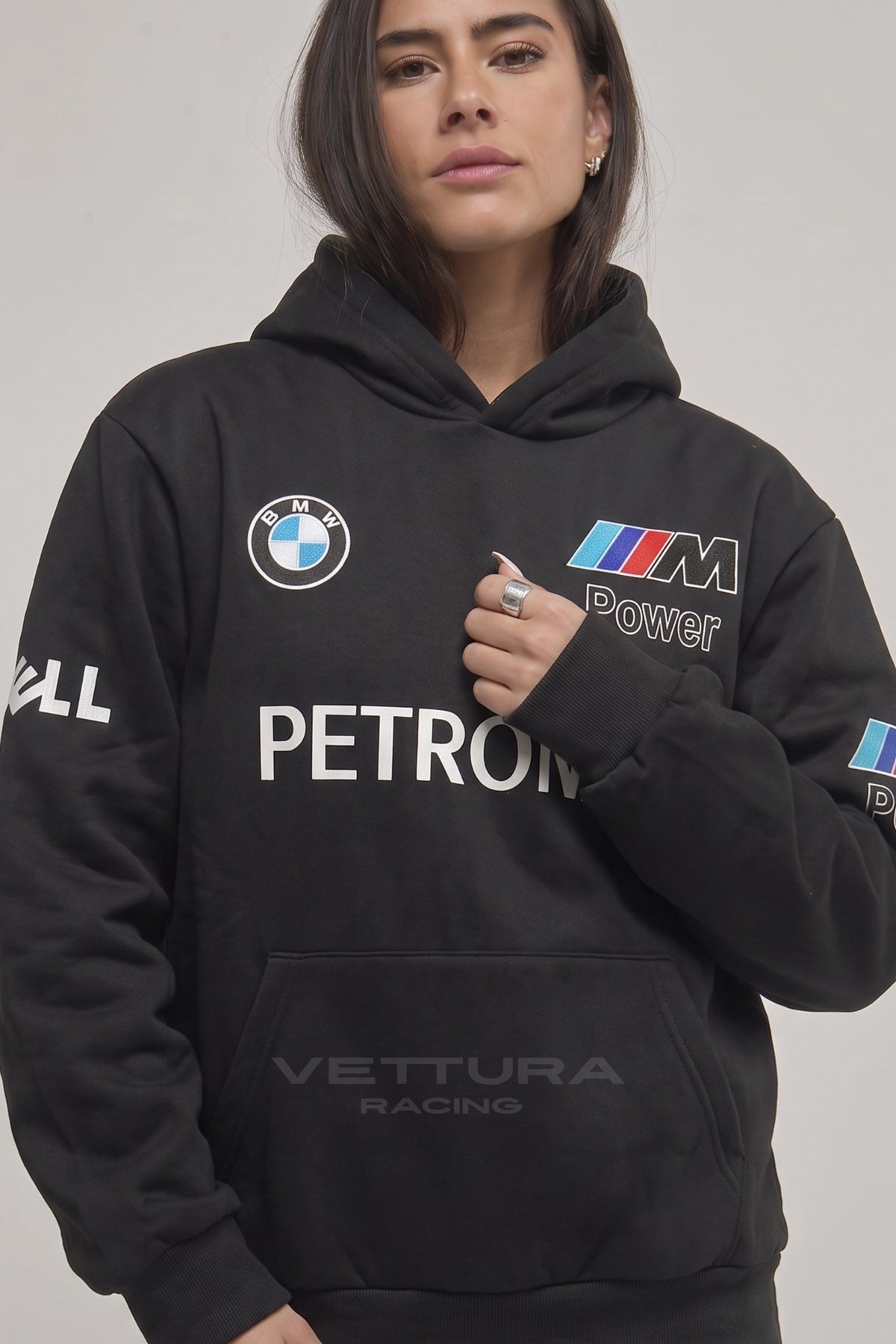 BMW F1 embroidered hoodie worn on the street, relaxed fit