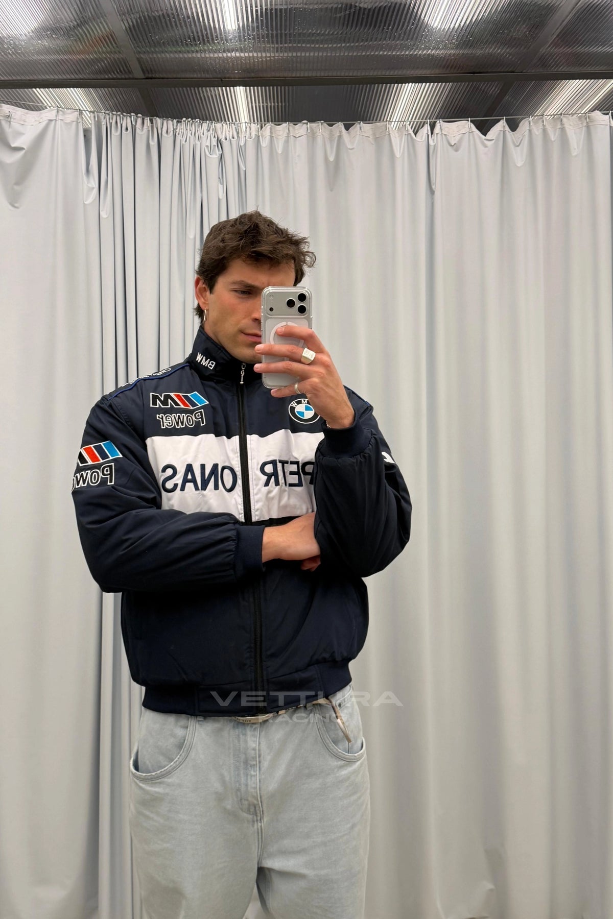 Mirror selfie wearing the BMW M Power Petronas racing jacket