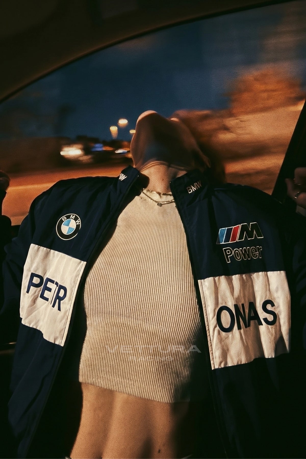 Close-up lifestyle shot of the BMW M Power racing jacket Petronas panel