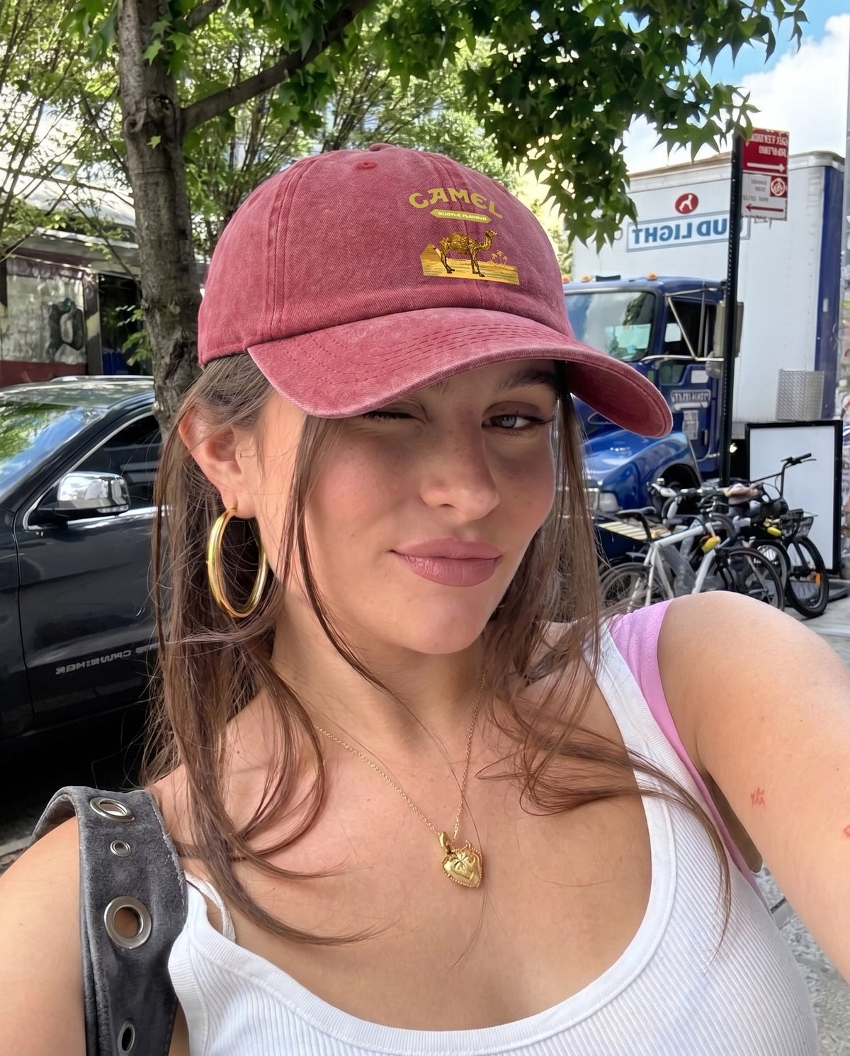 Red Camel Desert cap worn in the street