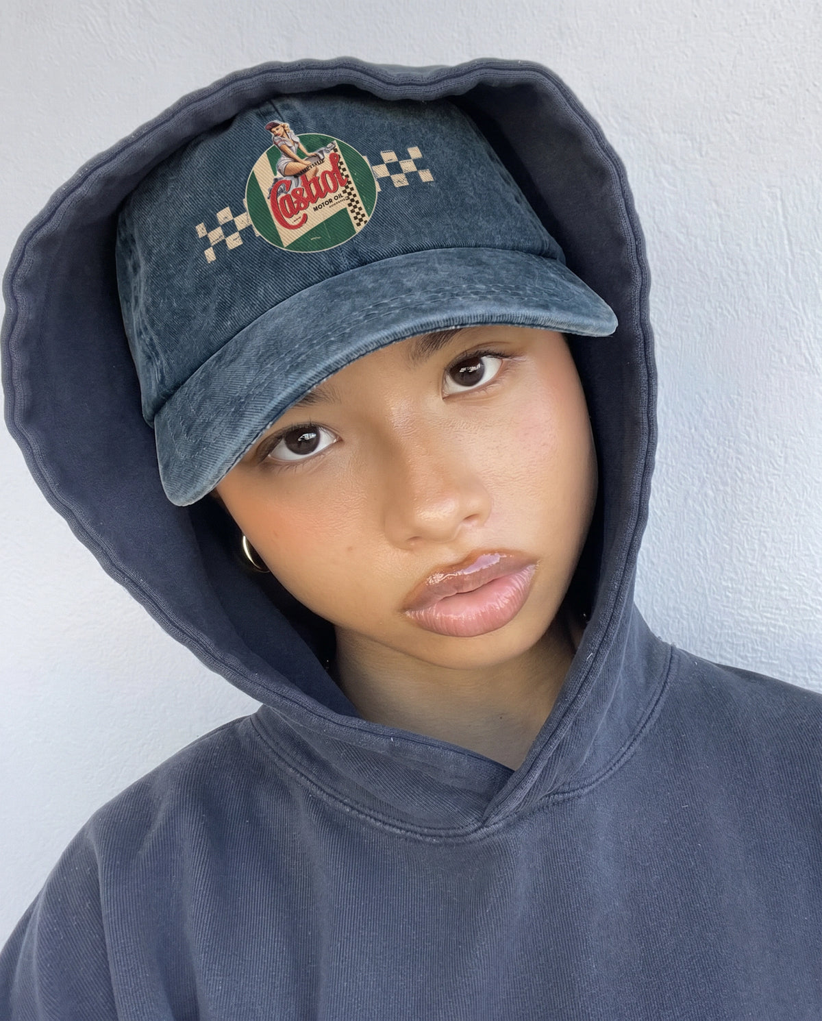 Castrol Motor cap worn over a hoodie