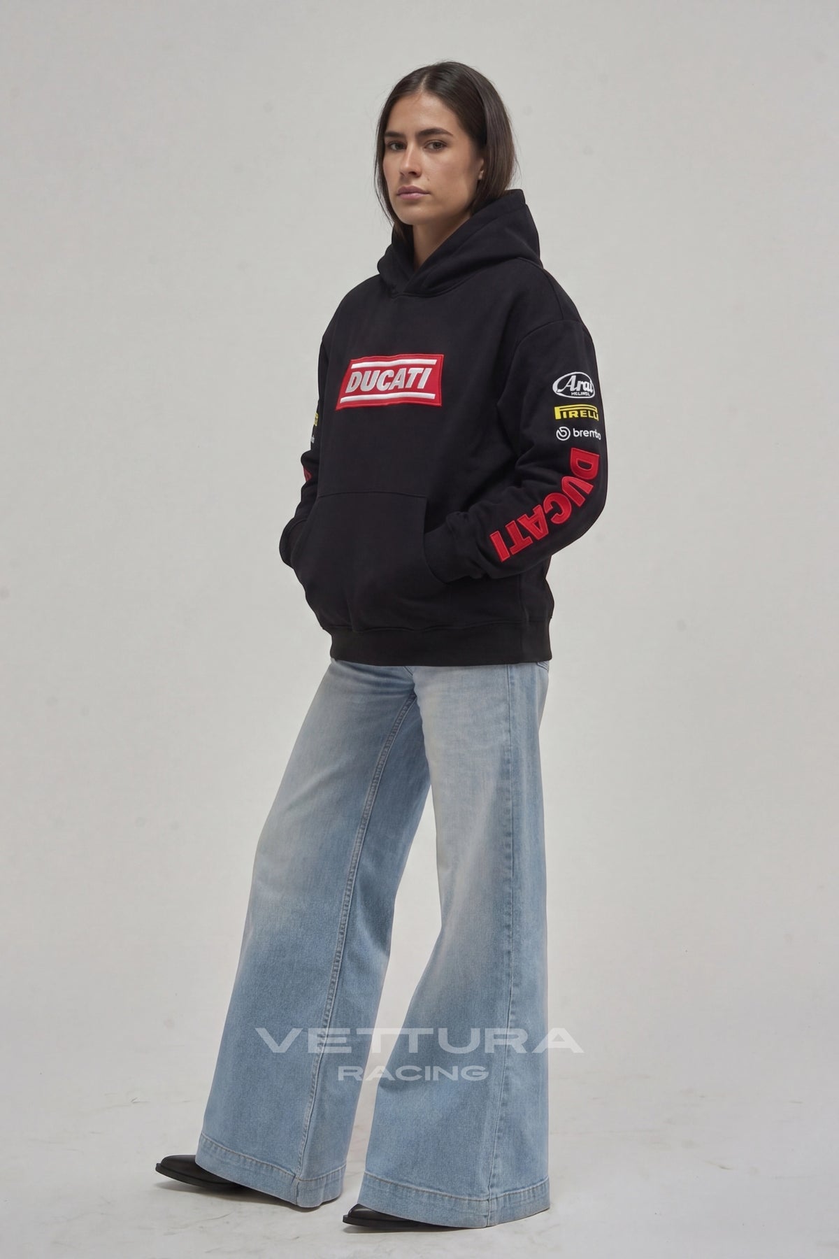 Model wearing the Ducati racing embroidered hoodie in black, front view