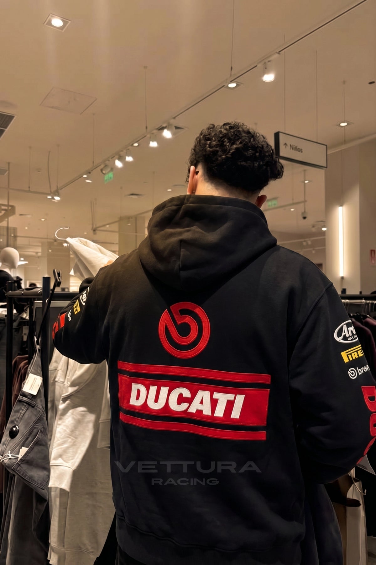 Detail of the stitched sleeve sponsors on the Ducati hoodie