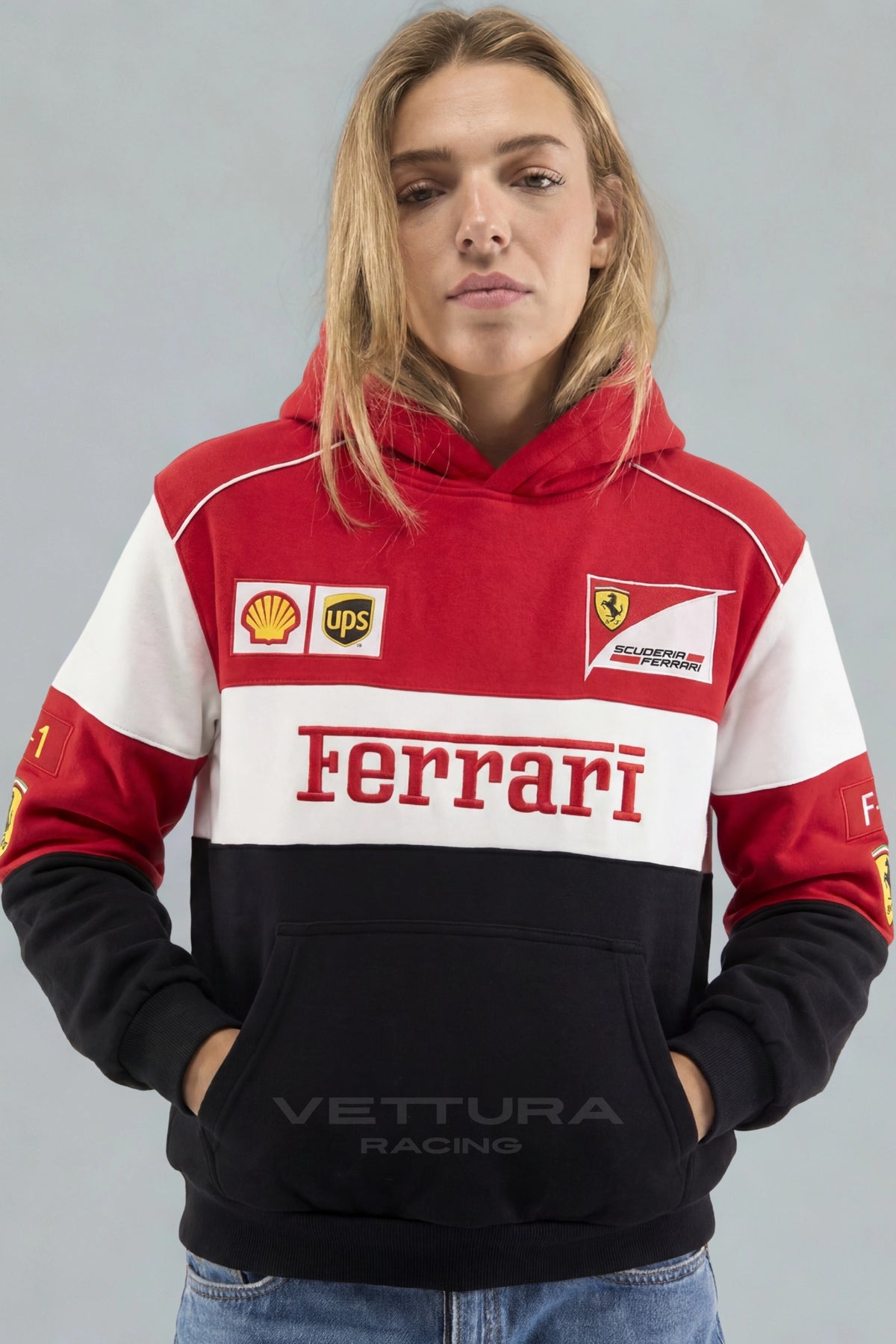 Ferrari F1 racing hoodie styled with jeans in daylight