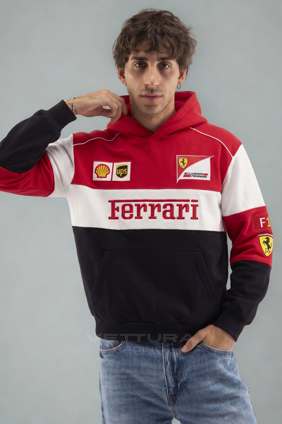 Back of the Ferrari F1 hoodie with the red and white colour blocking