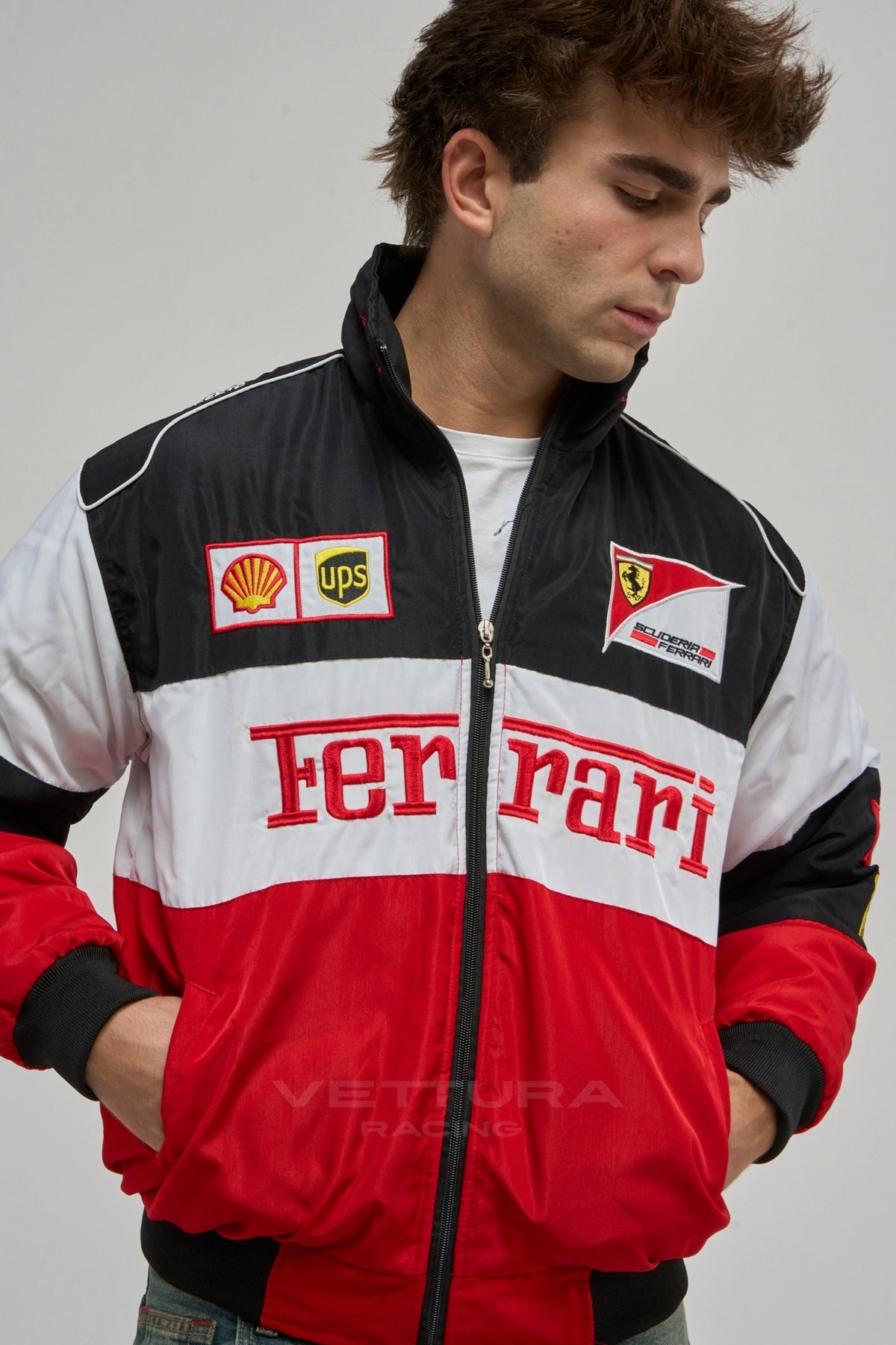 Ferrari F1 classic vintage racing jacket in black, white and red worn on the street