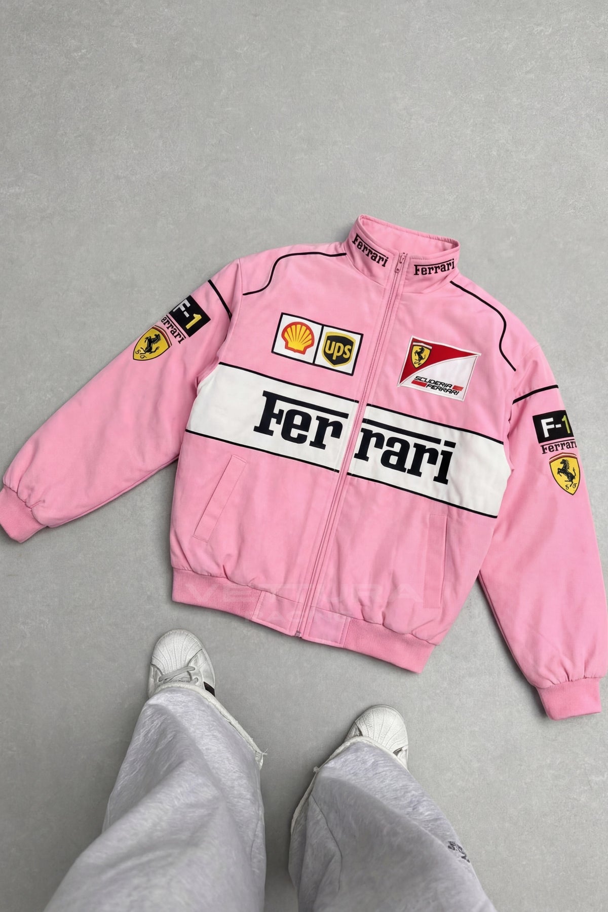 Ferrari F1 pink edition jacket on a model, back with the Prancing Horse