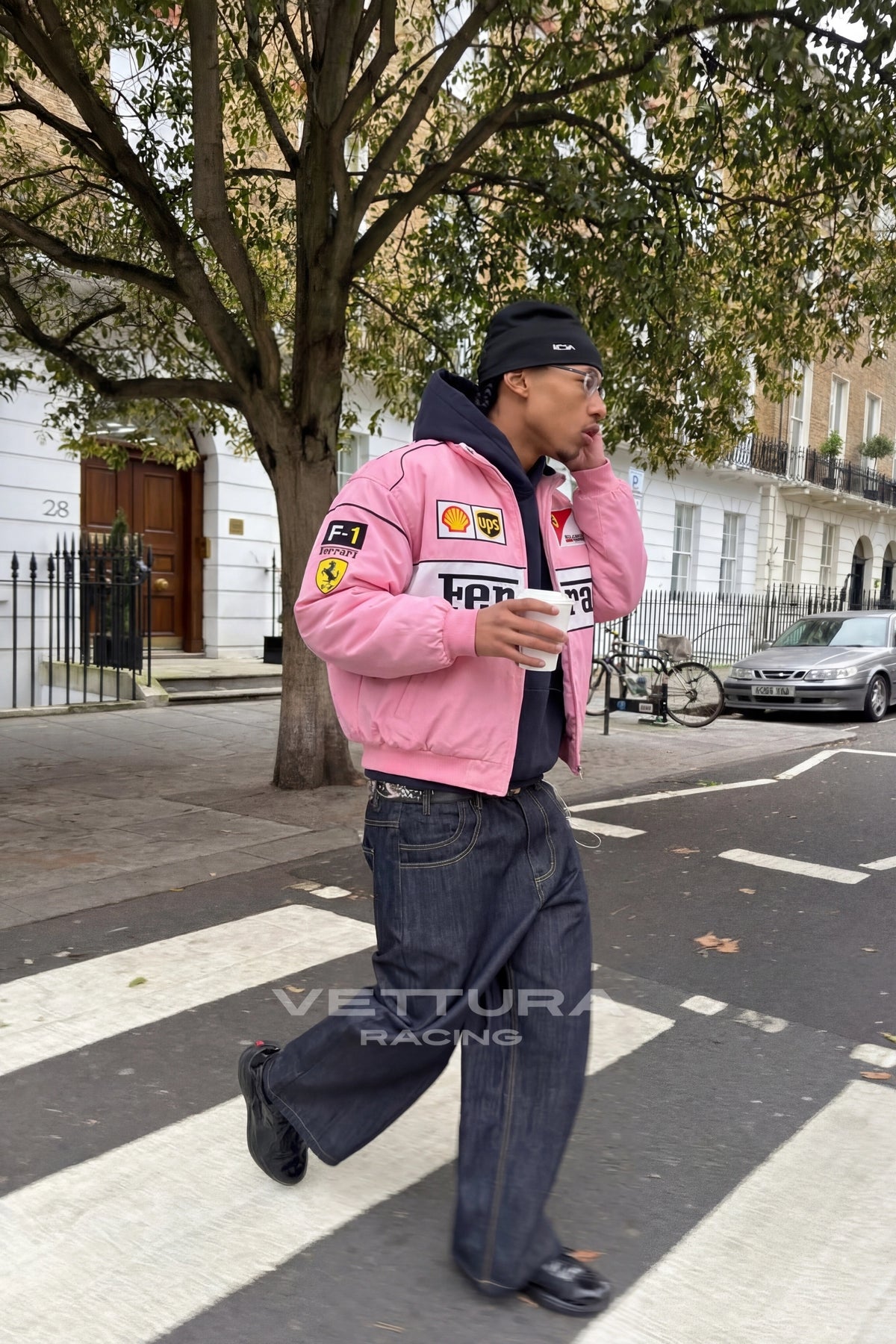 Ferrari F1 pink edition racing jacket photographed outdoors
