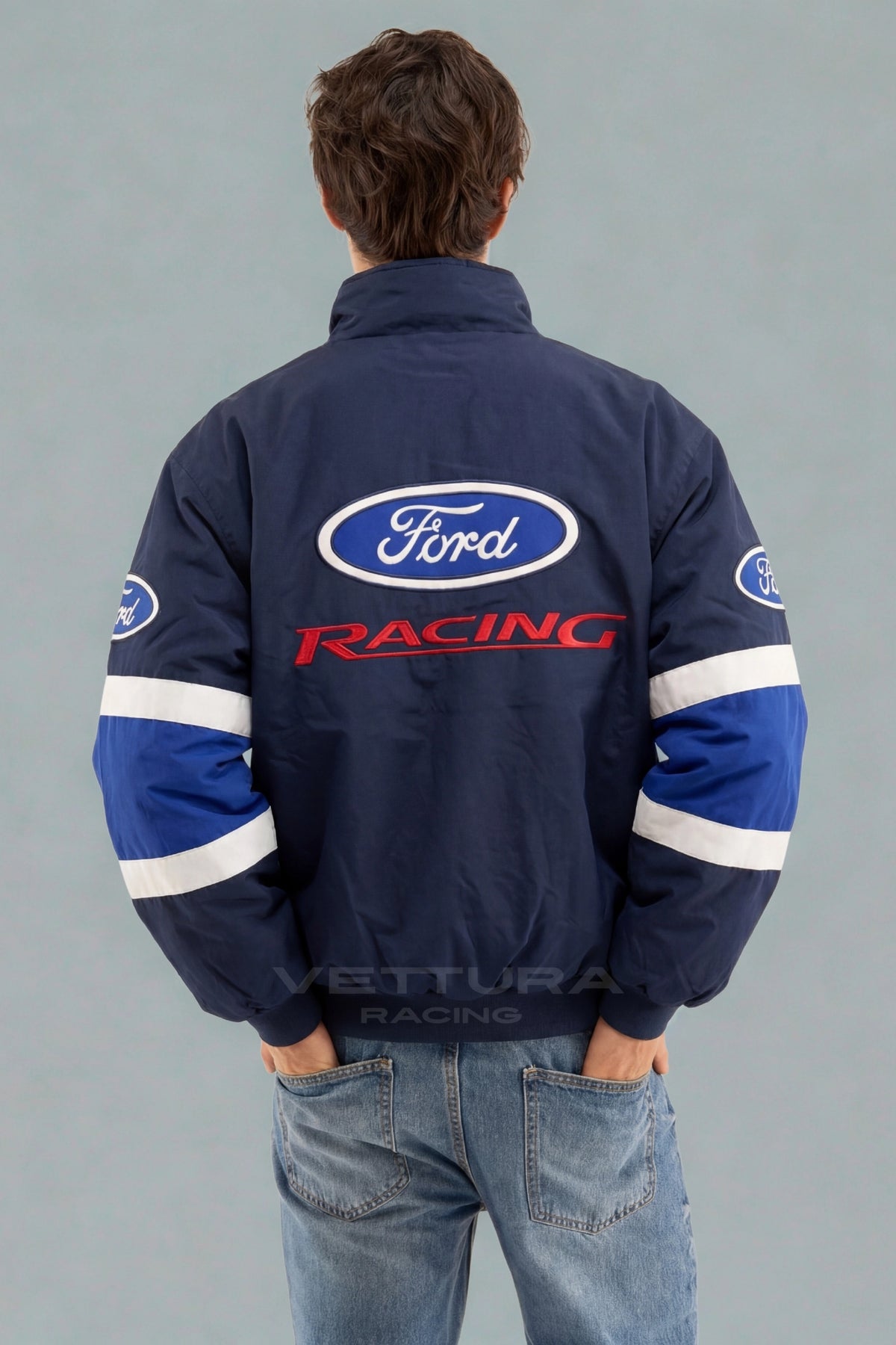 Back of the blue Ford Racing vintage bomber jacket with embroidered Ford oval