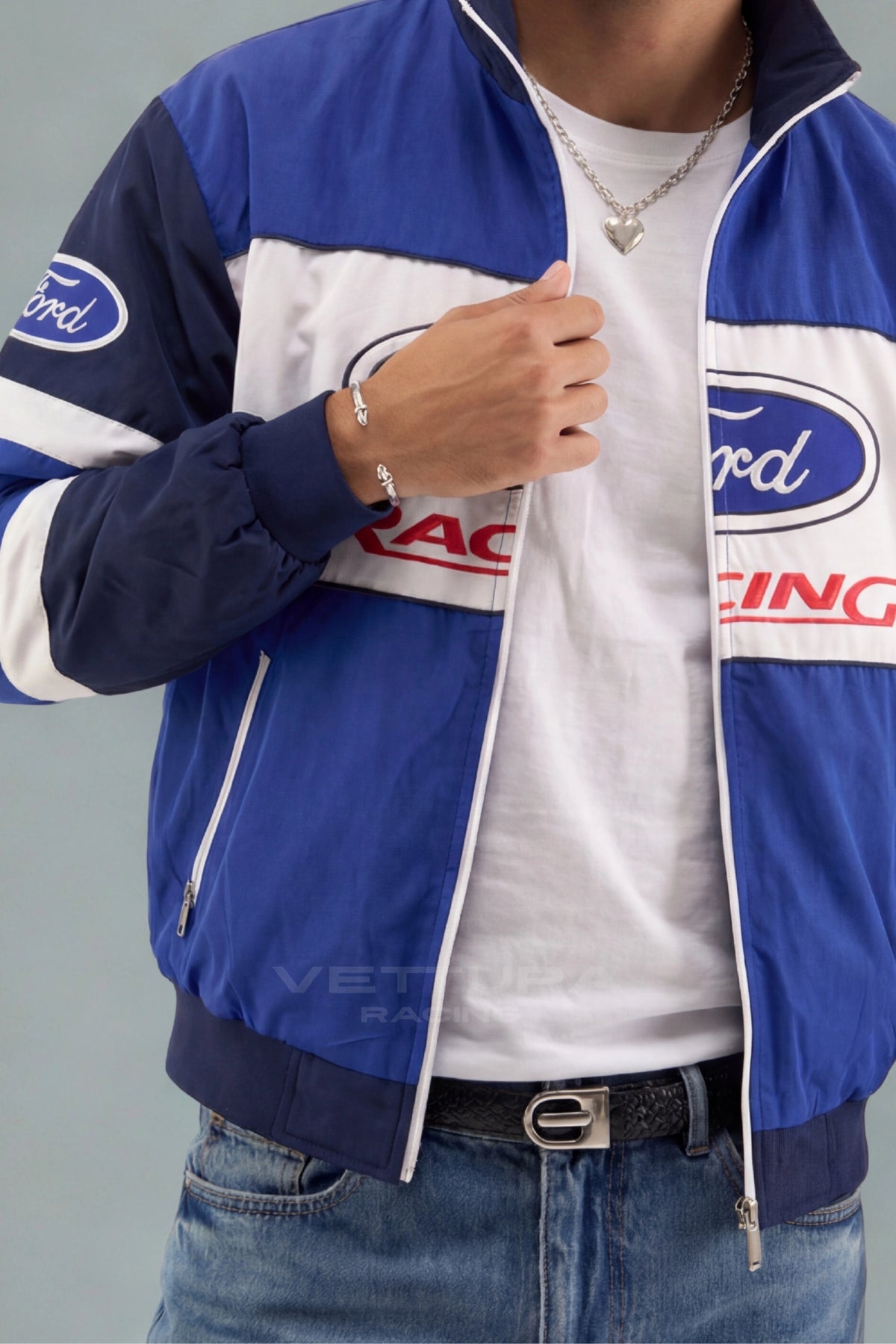 Close-up of the Ford Racing bomber jacket zip and embroidered chest logo