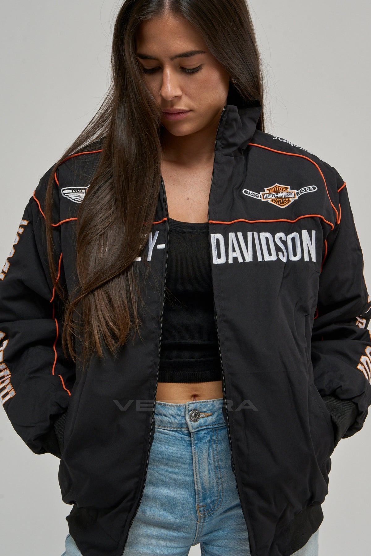 Woman wearing the black Harley Davidson vintage bomber jacket