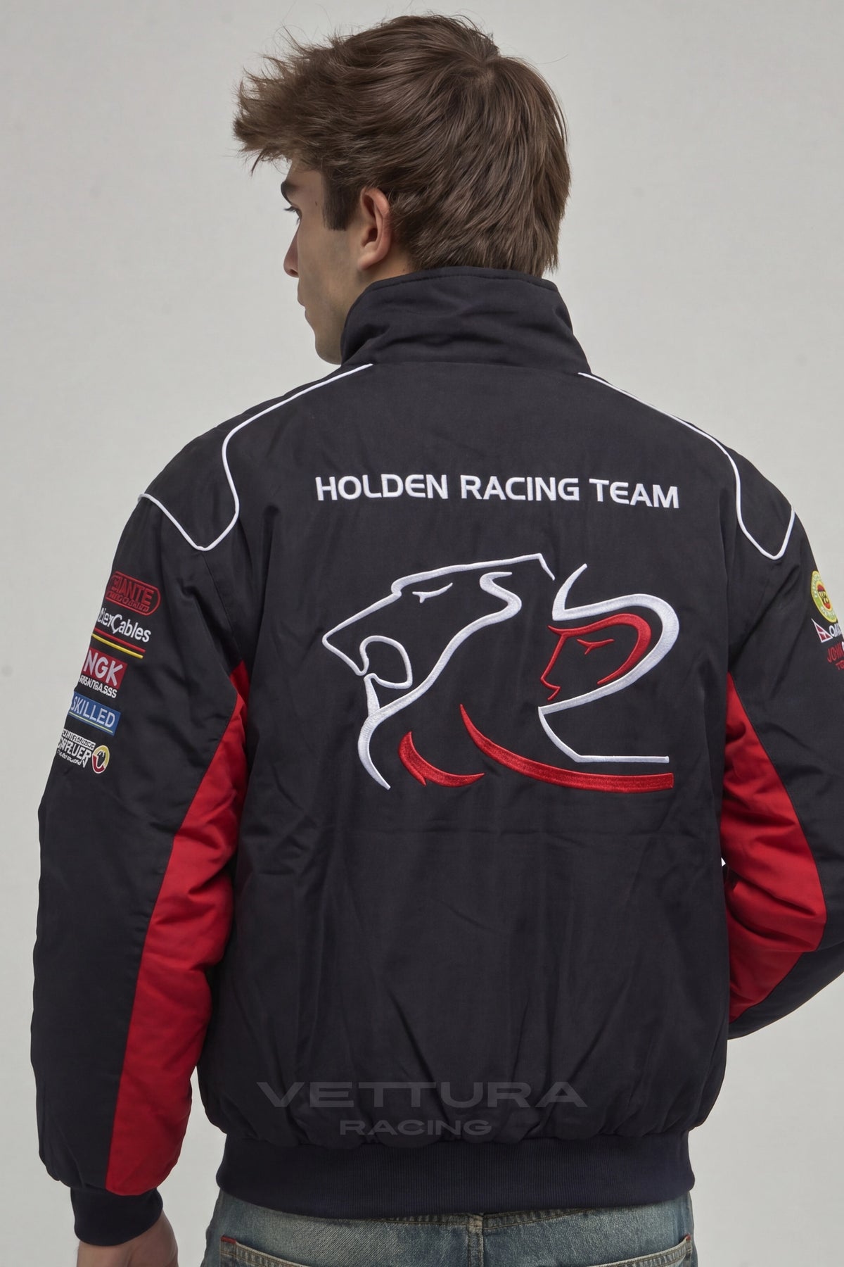 Holden Racing Team jacket worn with jeans, red chest band detail
