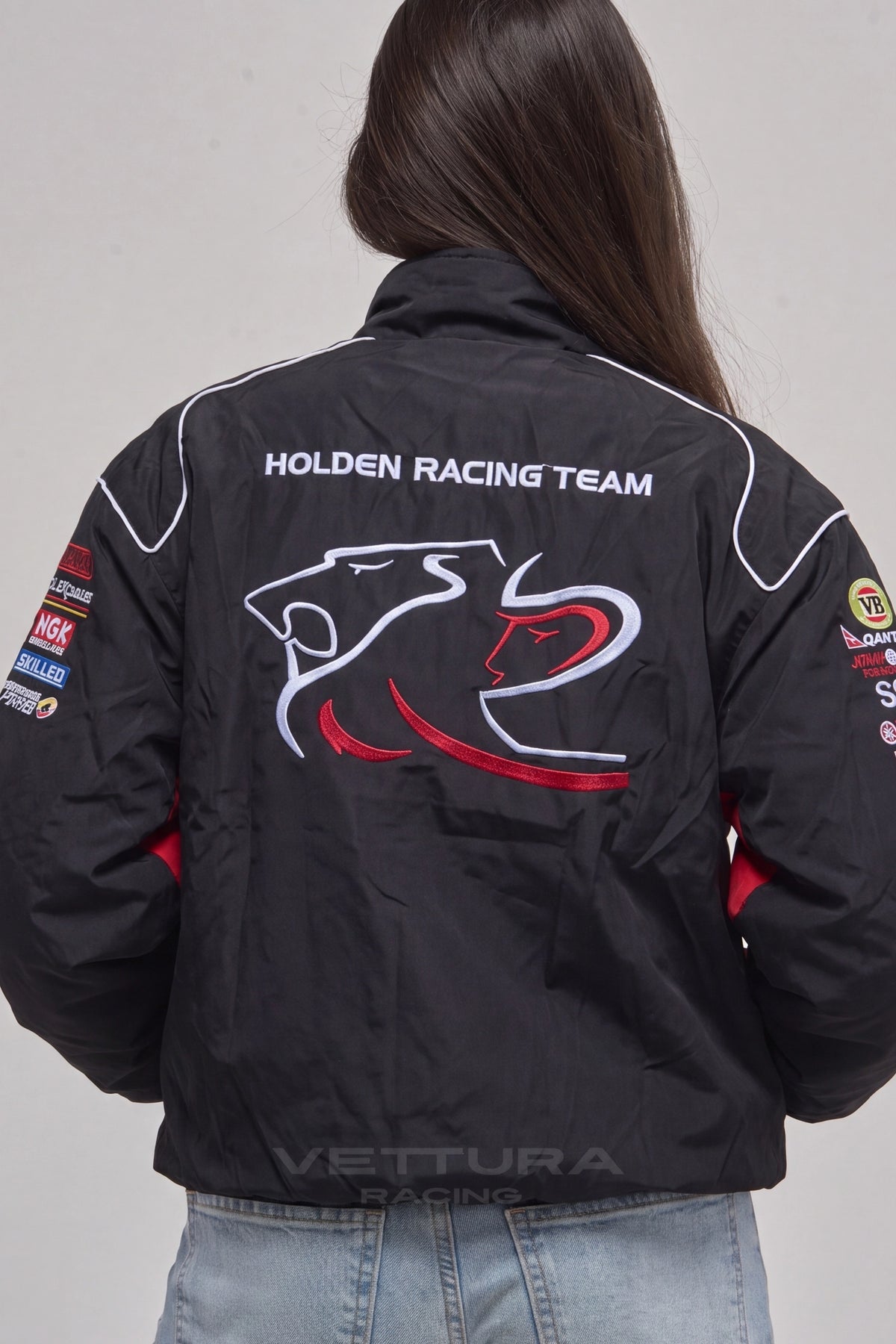Holden racing jacket styled outdoors in daylight