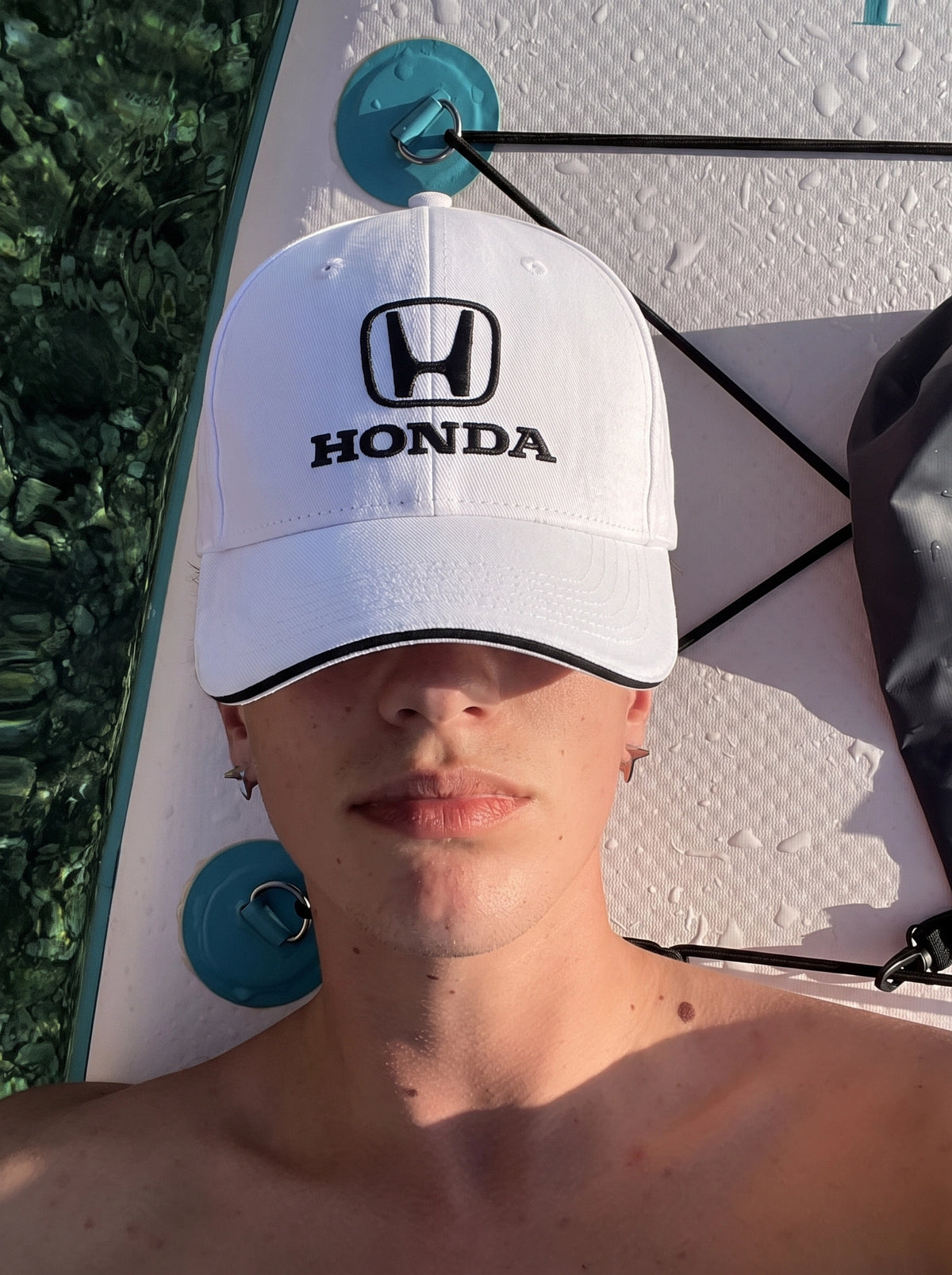 Model wearing the white Honda Classic cap