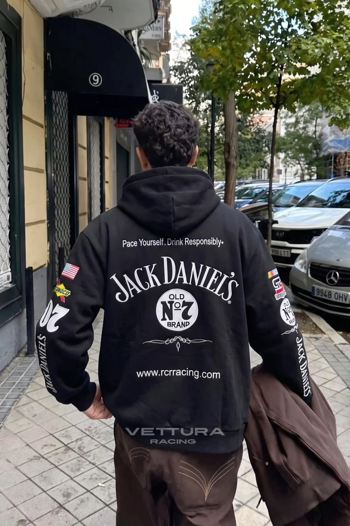 Back of the Jack Daniel’s racing hoodie worn on the street, everyday styling