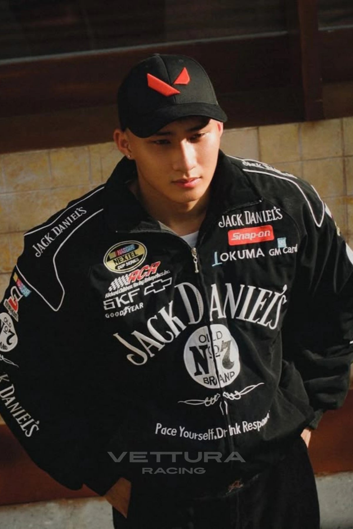 Outdoor lifestyle shot of the Jack Daniel's racing vintage jacket