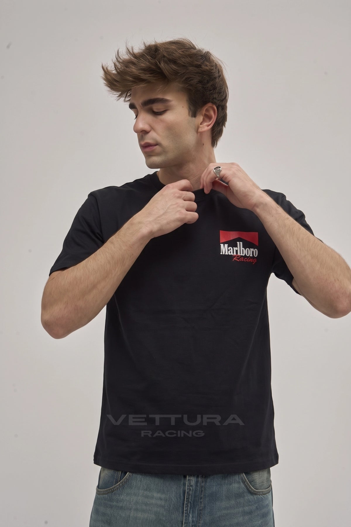 Model wearing the Marlboro Racing F1 t-shirt in black, front view