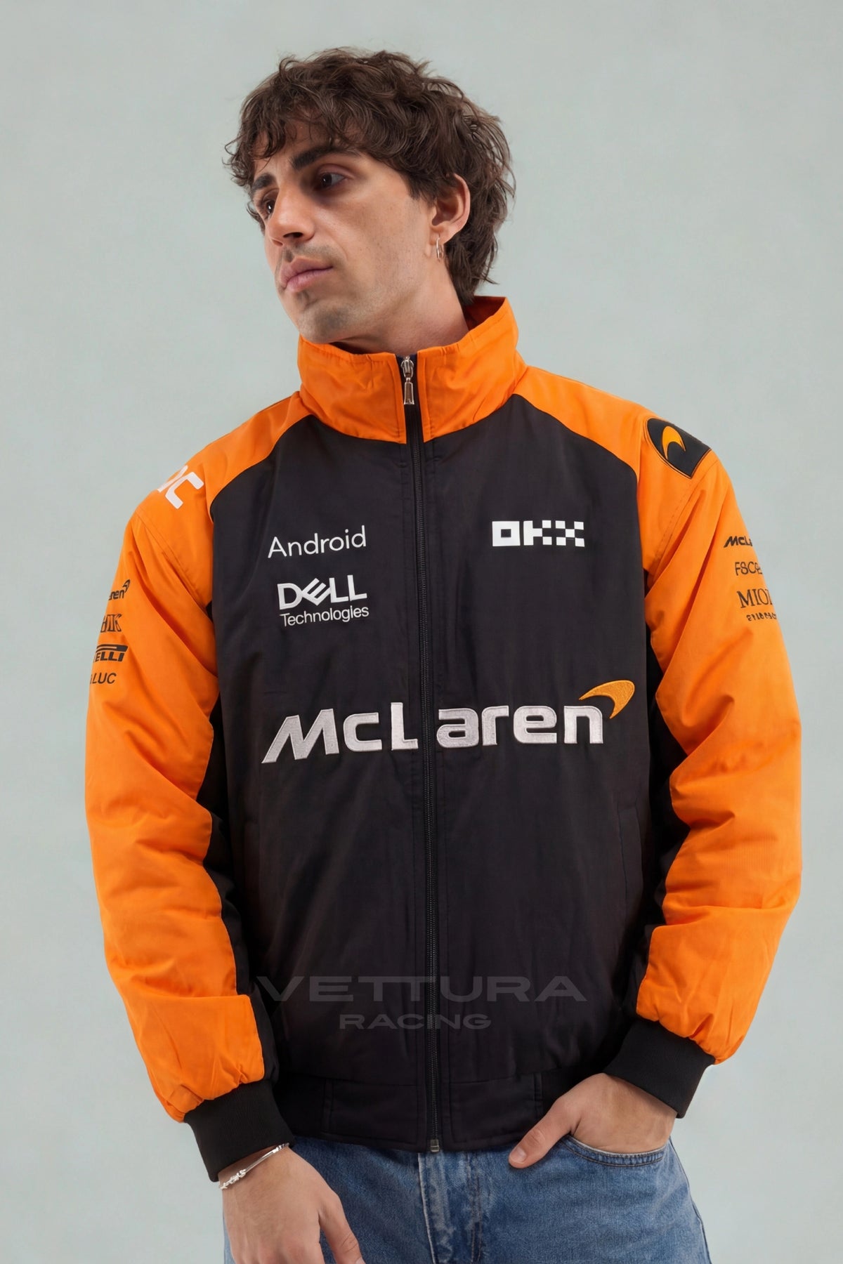 Model wearing the McLaren F1 papaya racing jacket, front view