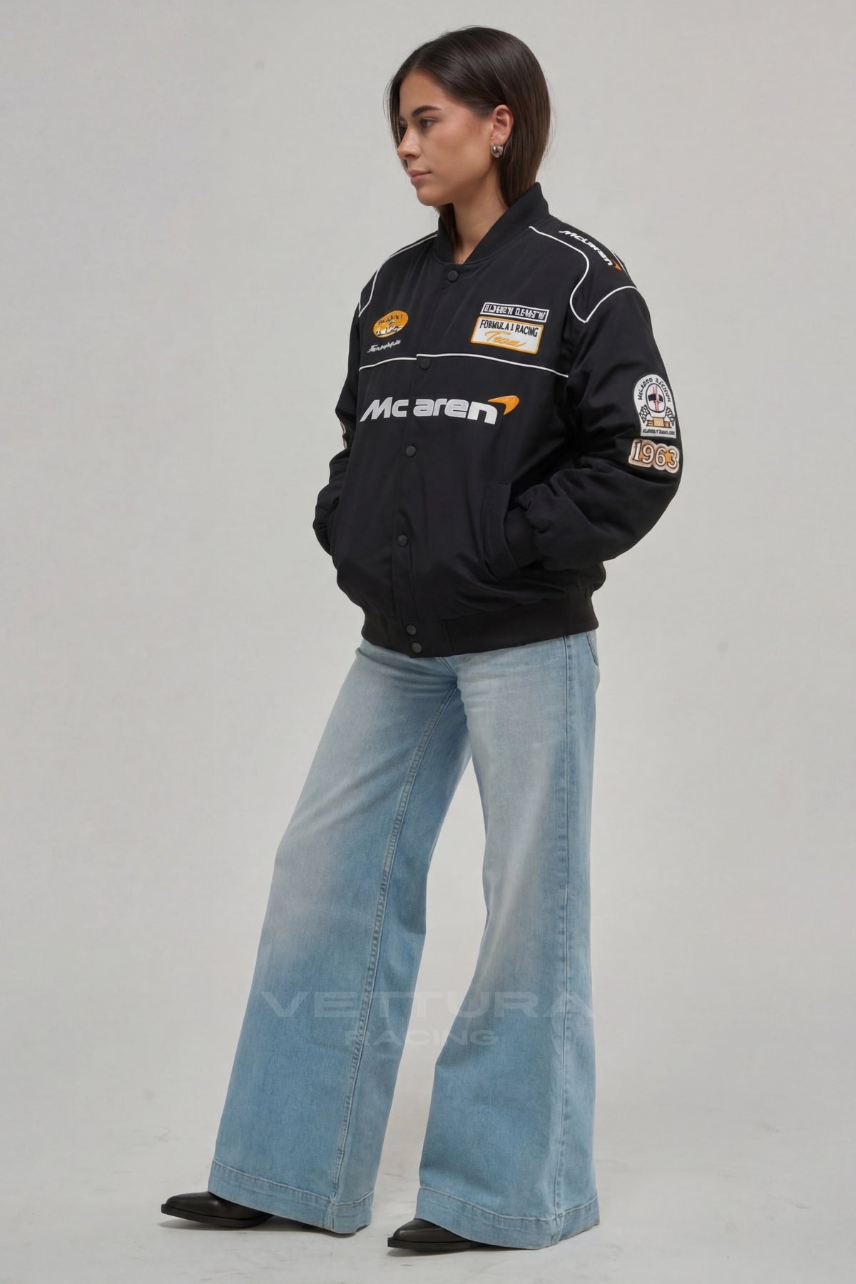 McLaren F1 Team jacket on a model, sponsor patch detail