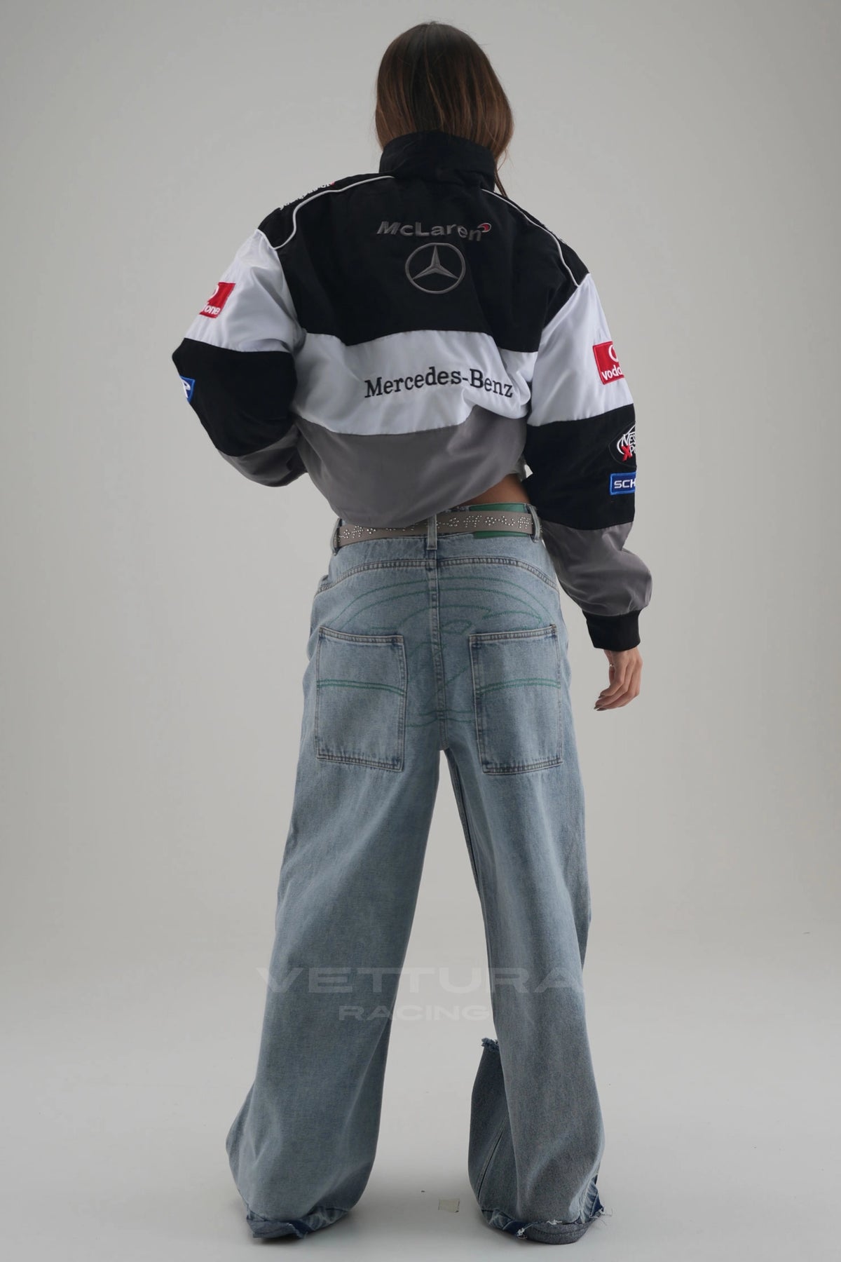 Rear view of the McLaren Mercedes F1 bomber jacket showing the Mercedes-Benz back panel