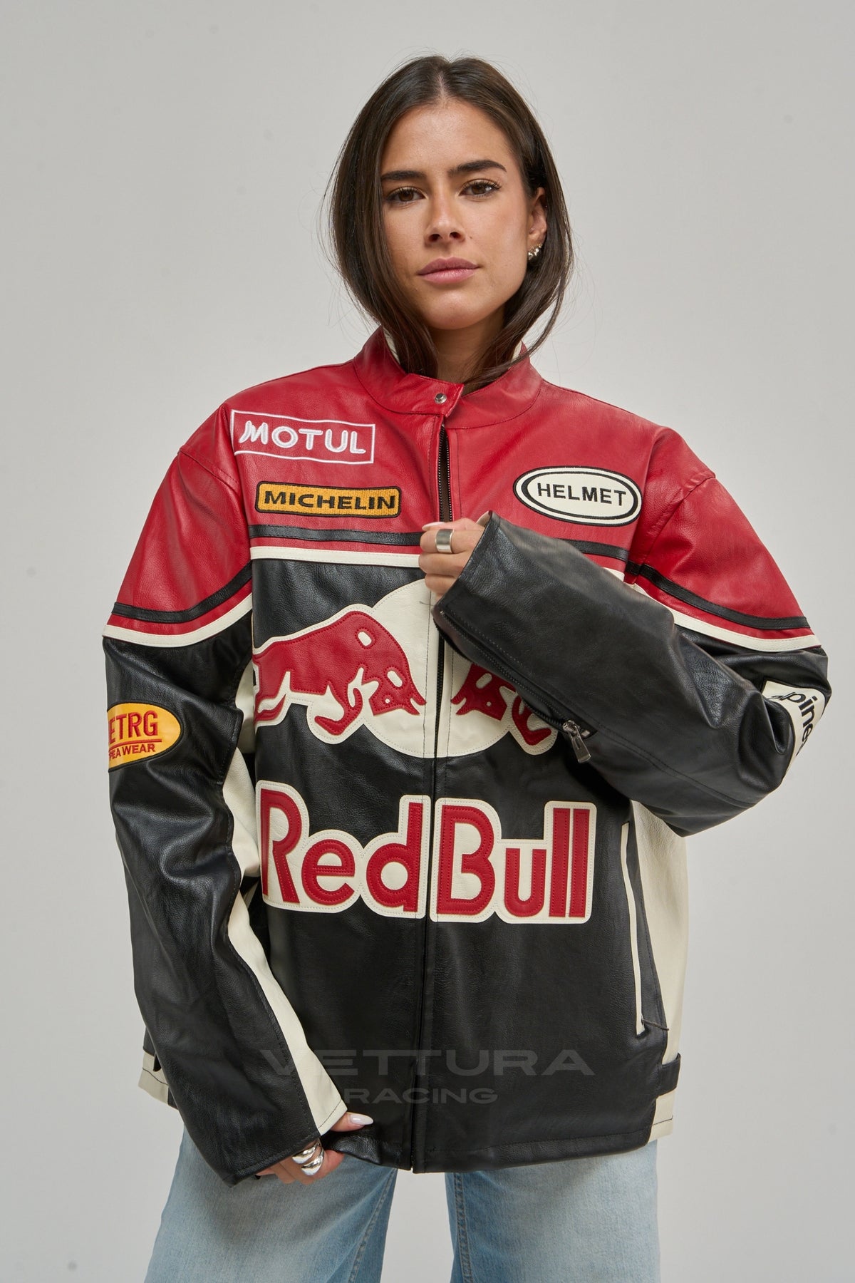 Woman wearing the red and black Red Bull racing leather jacket