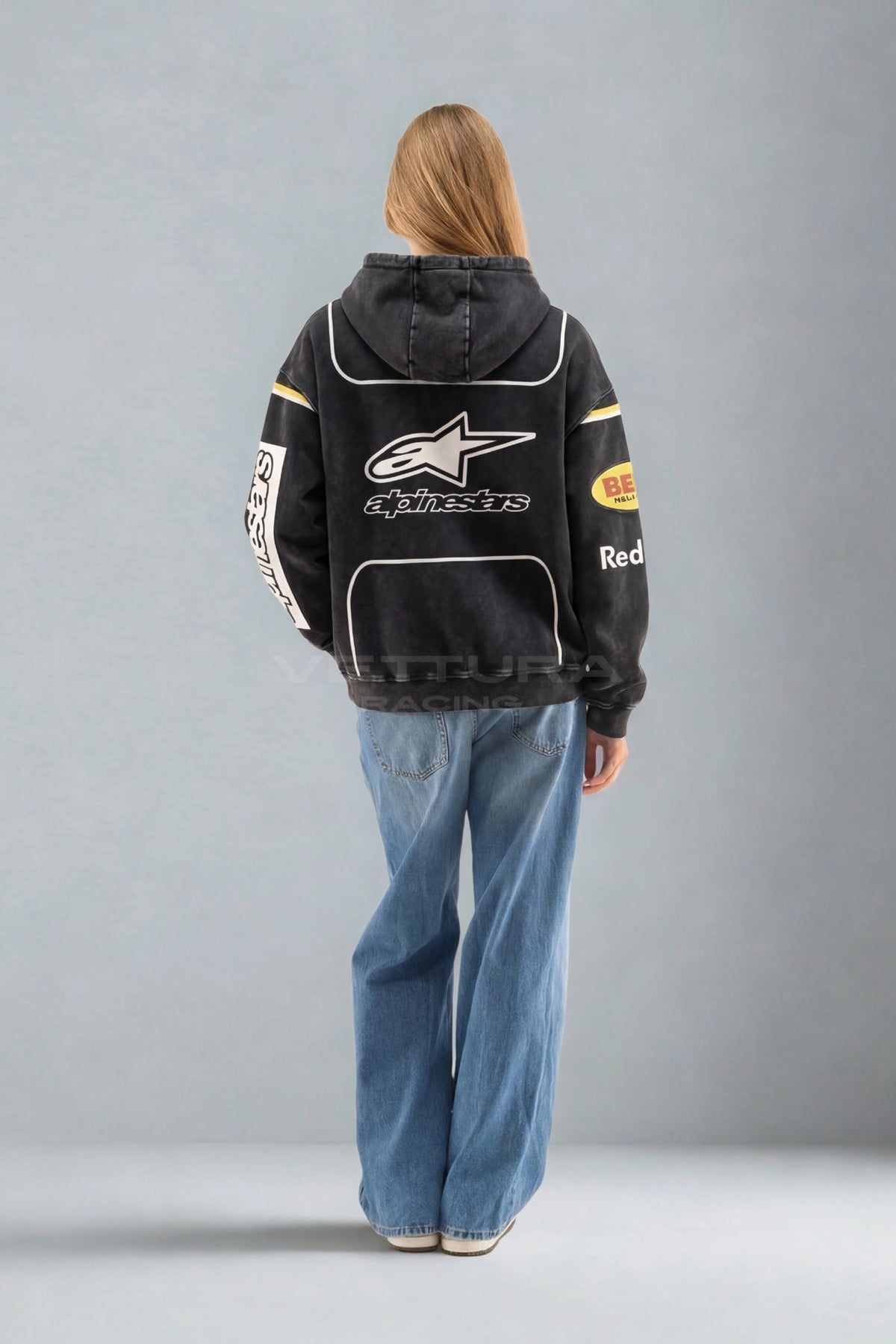 Back of the Red Bull Racing carbon wash hoodie with the Alpinestars star