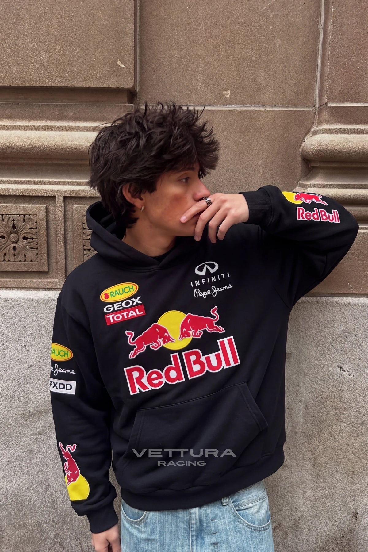 Red Bull Racing F1 embroidered hoodie worn with the hood up on the street