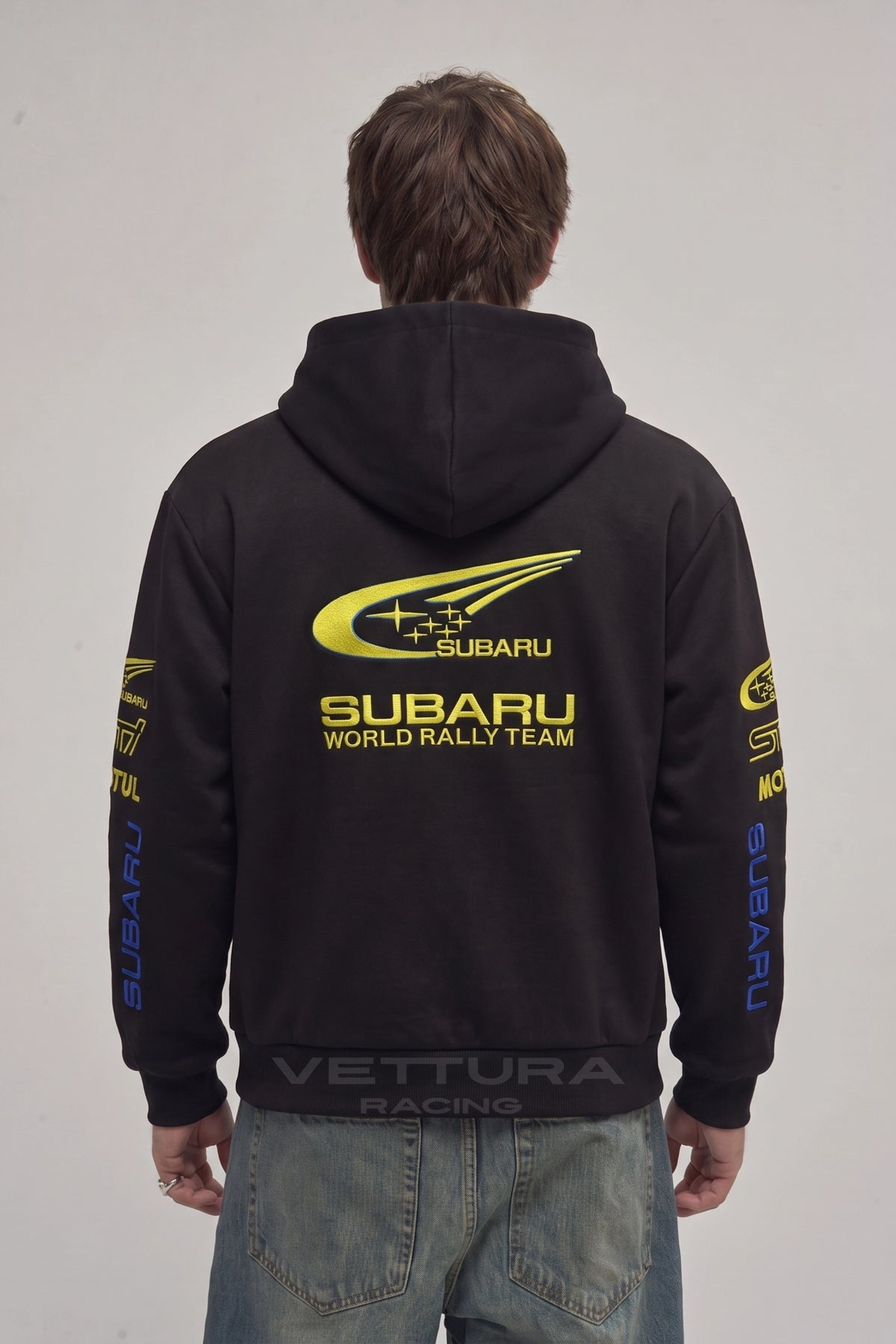 Close view of the embroidered STI and Motul sleeve logos on the Subaru hoodie