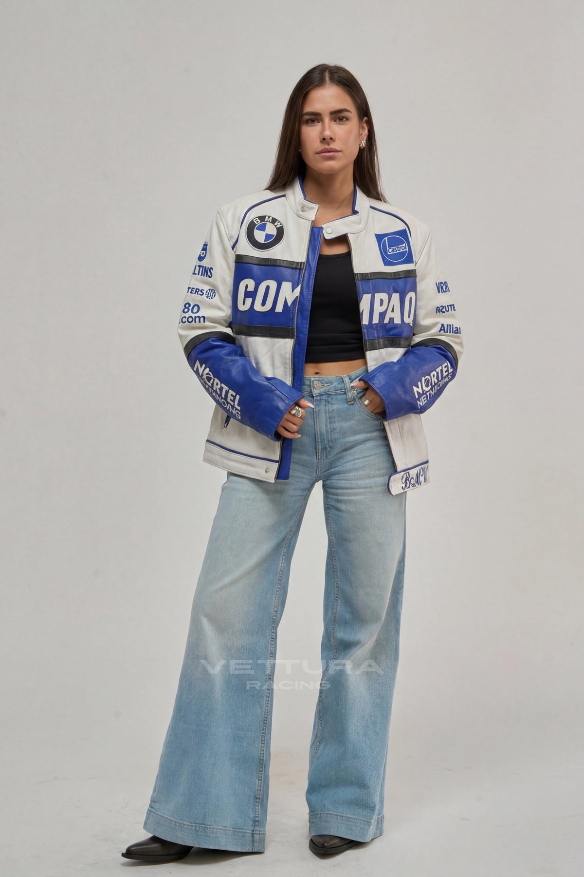 BMW Compaq leather jacket on a model, showing the blue sleeve panels