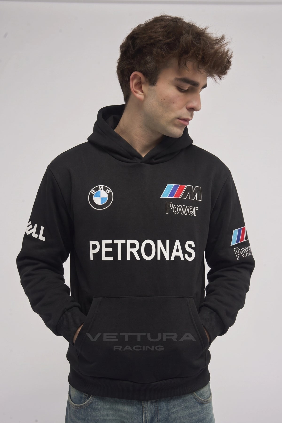 BMW F1 racing hoodie styled with jeans in daylight