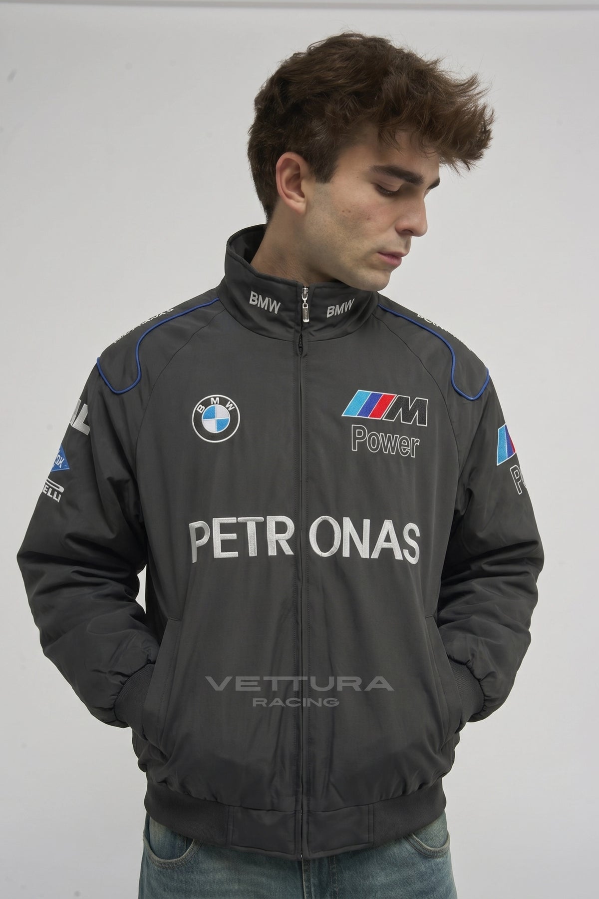 BMW F1 vintage racing jacket styled with jeans in daylight