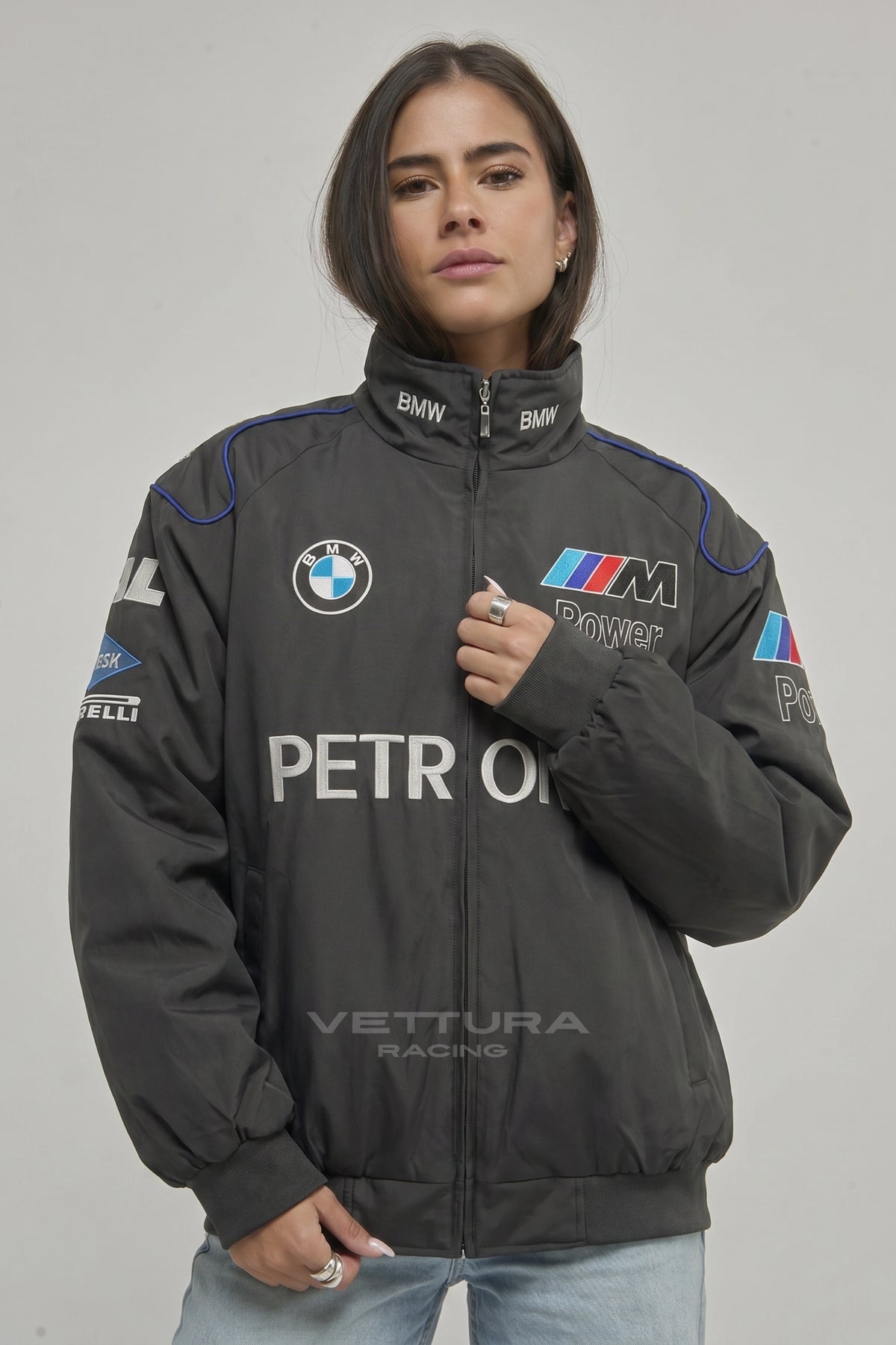 Model wearing the BMW F1 vintage racing jacket in black, front view