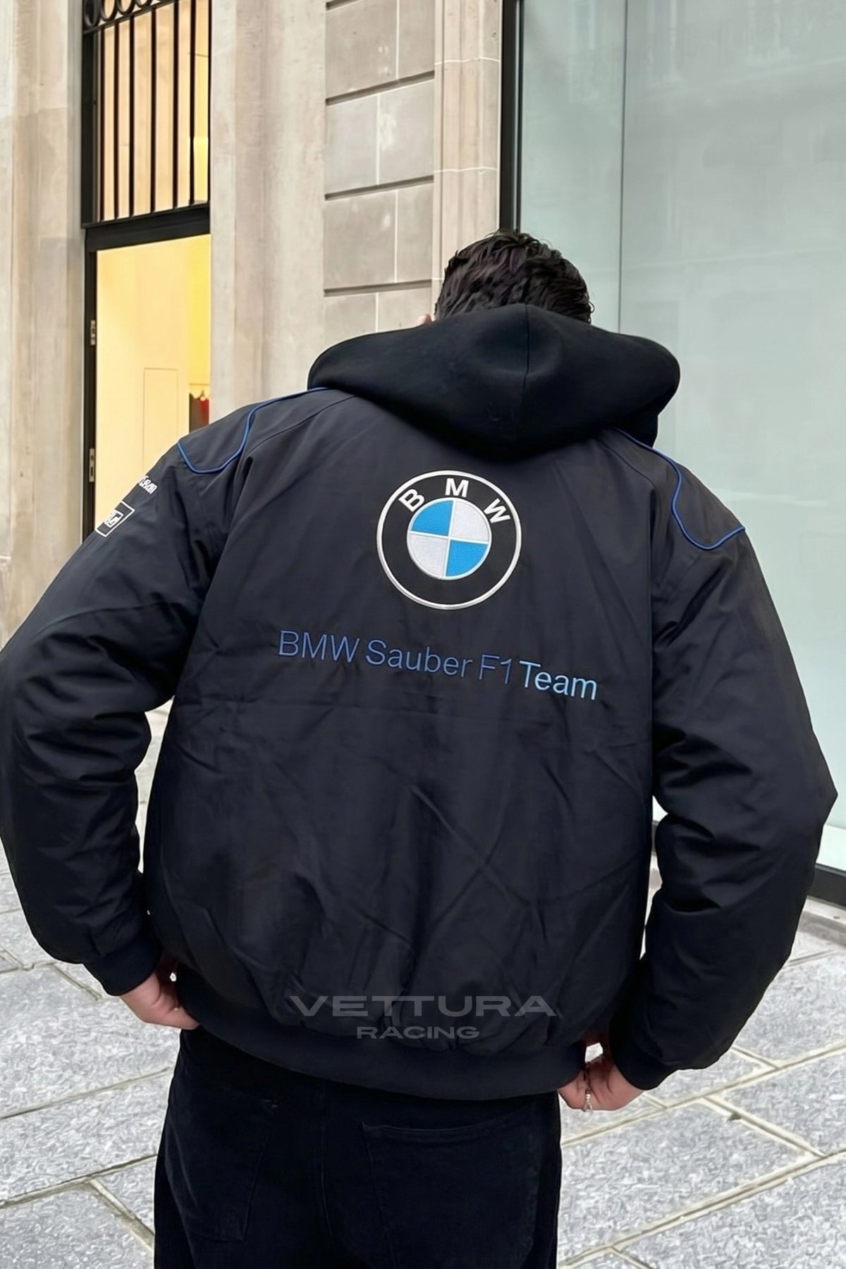 Detail of the BMW roundel patch on the racing jacket sleeve