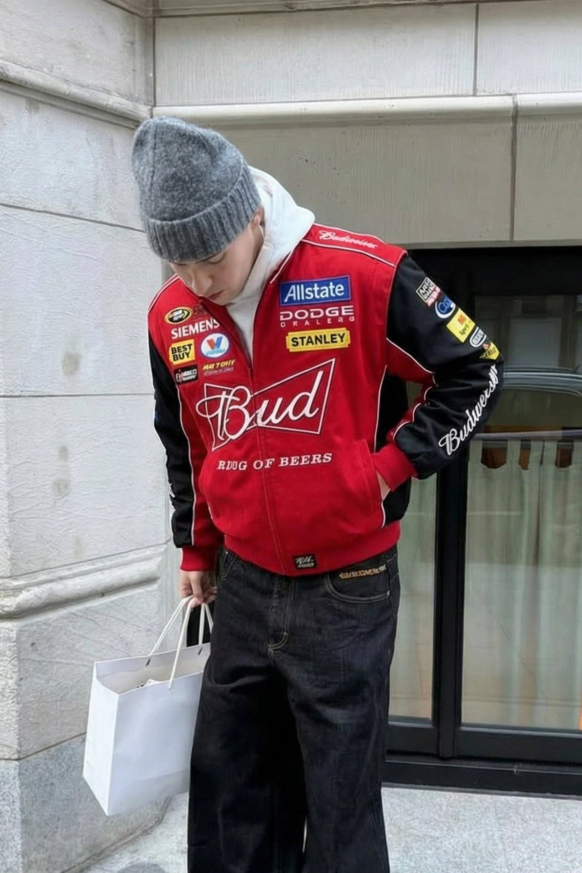Detail of the embroidered Budweiser NASCAR red jacket sleeve