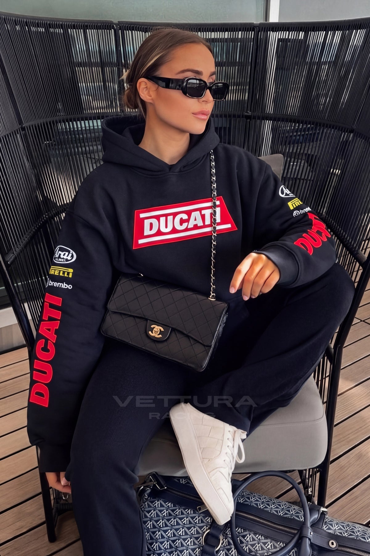Ducati racing hoodie photographed outdoors, everyday styling