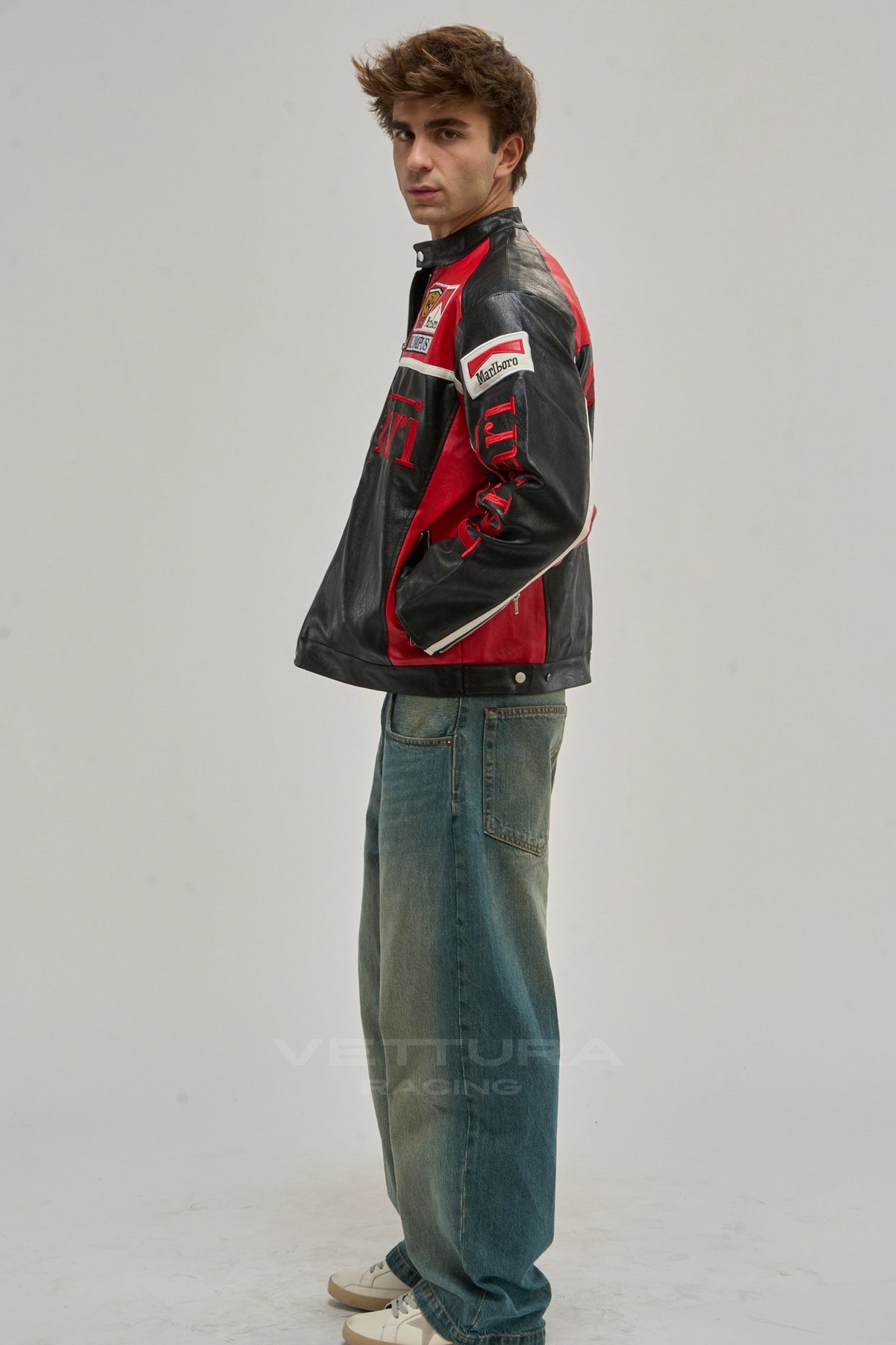 Model wearing the Ferrari F1 Olympus red edition leather racing jacket, front view
