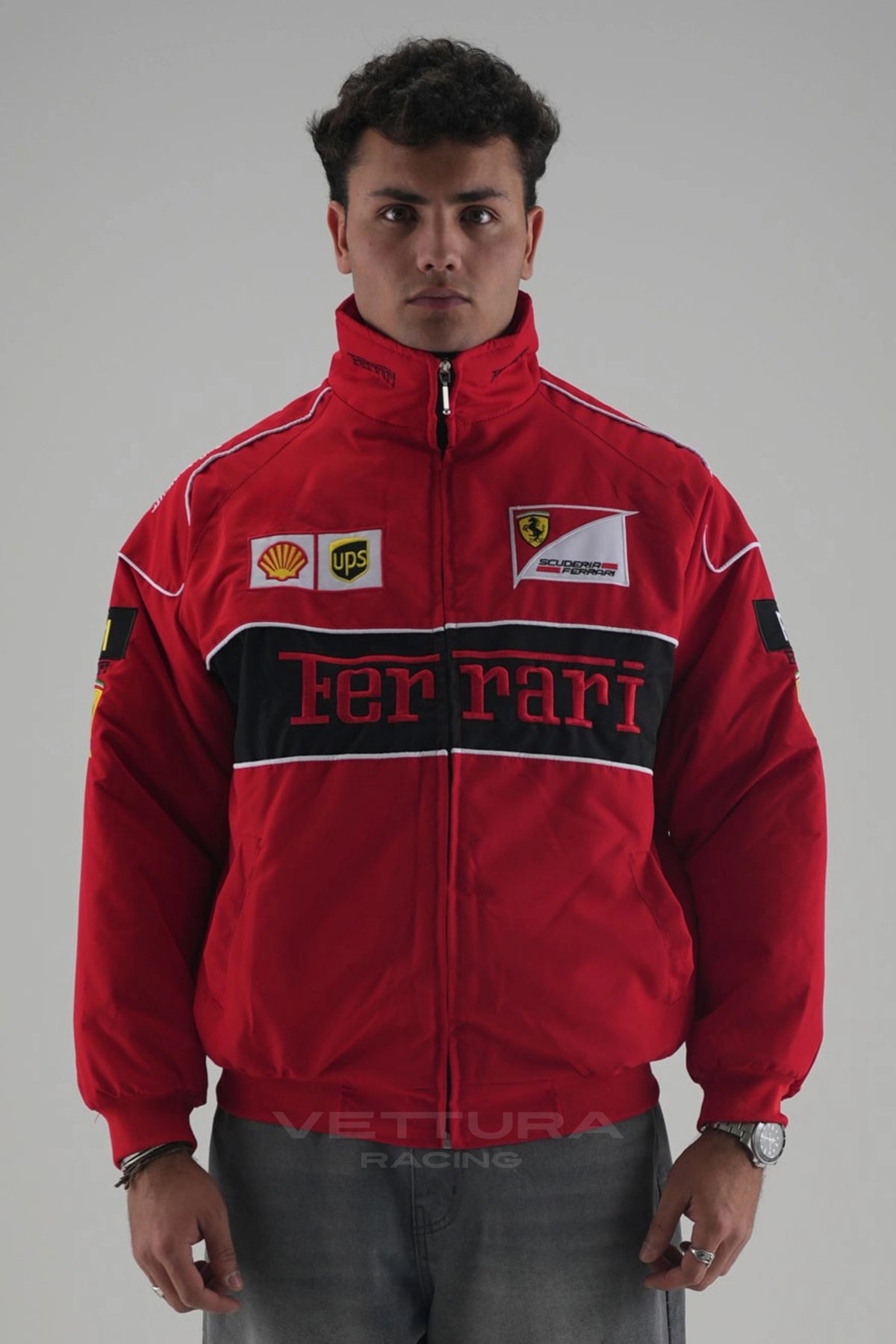 Ferrari F1 vintage racing jacket in red worn on the street, embroidered Shell and F-1 sponsor patches