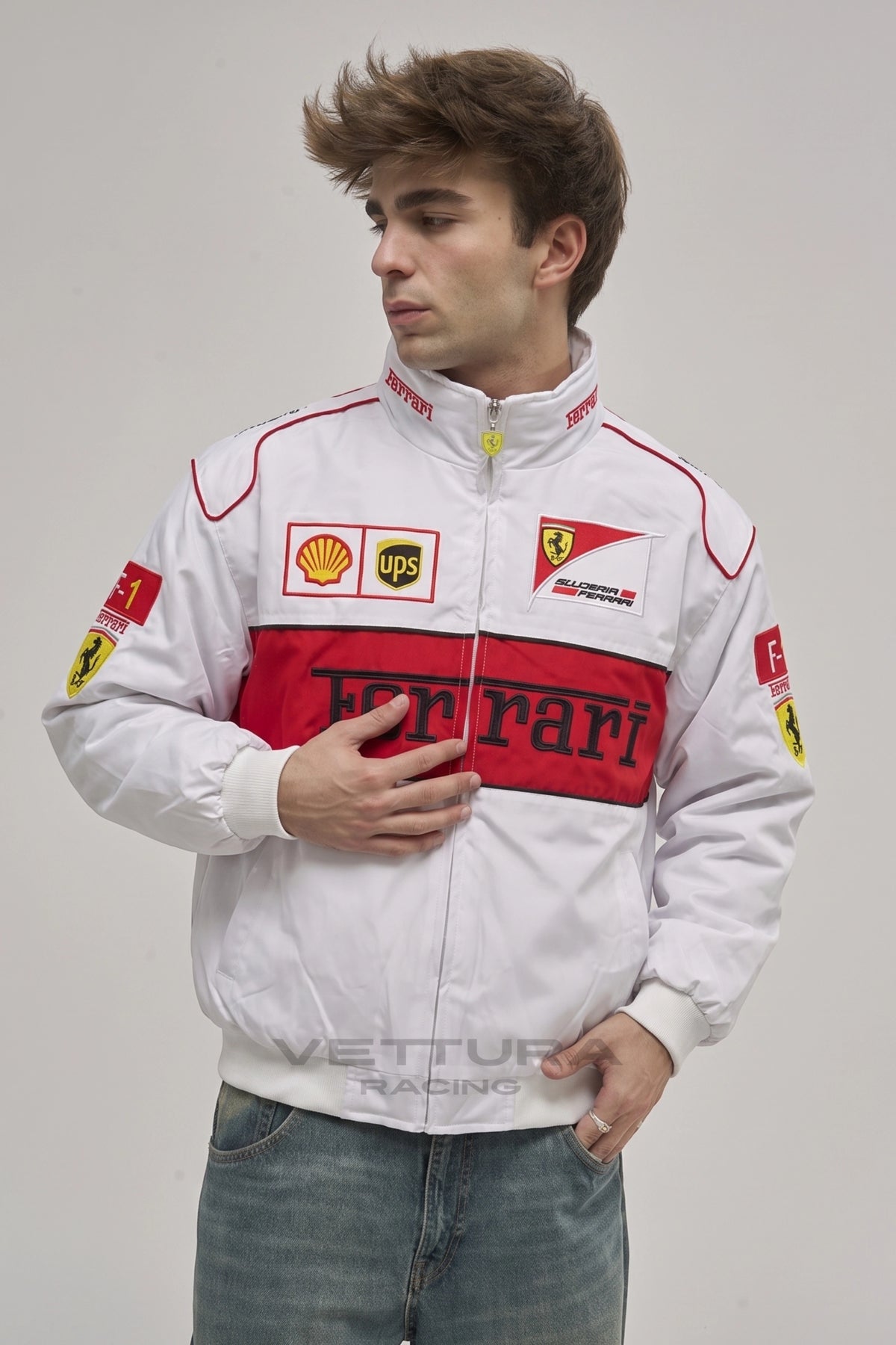 Model wearing the Ferrari F1 white edition vintage racing jacket, front view