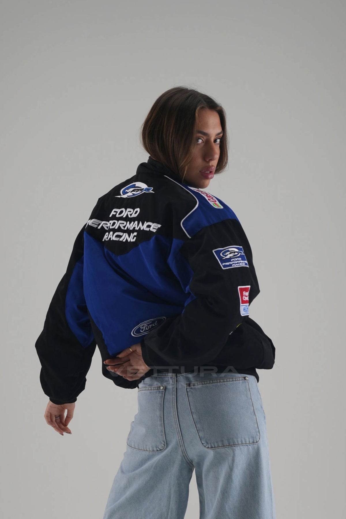 Detail of the Ford Performance Racing jacket zip and chevron panels
