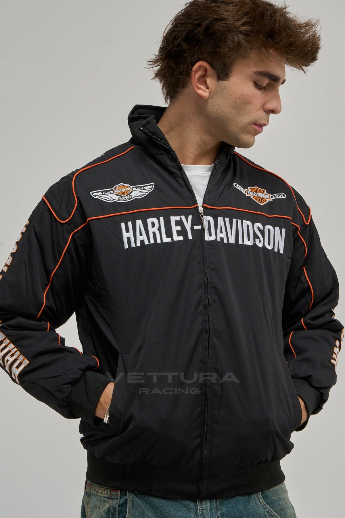 Model wearing the black Harley Davidson vintage jacket, front view