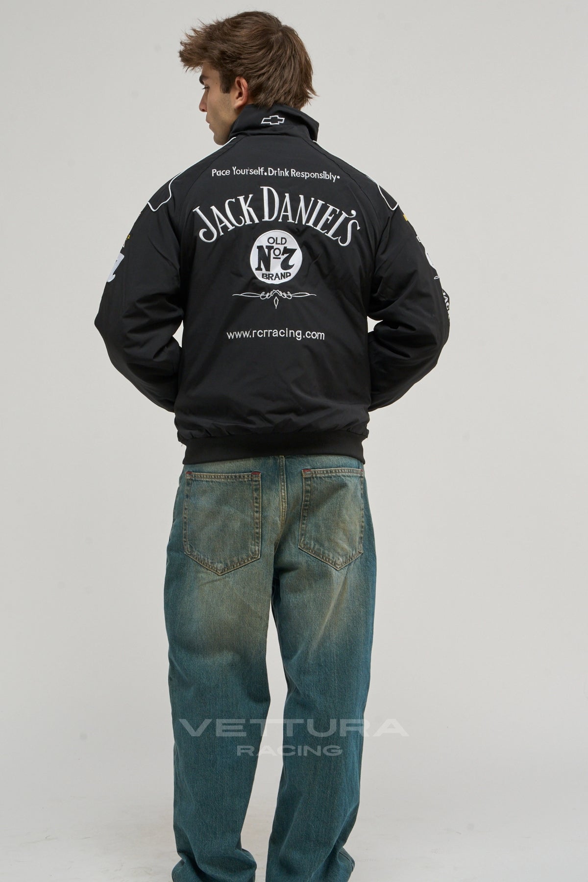 Back of the black Jack Daniel's racing vintage jacket on a model