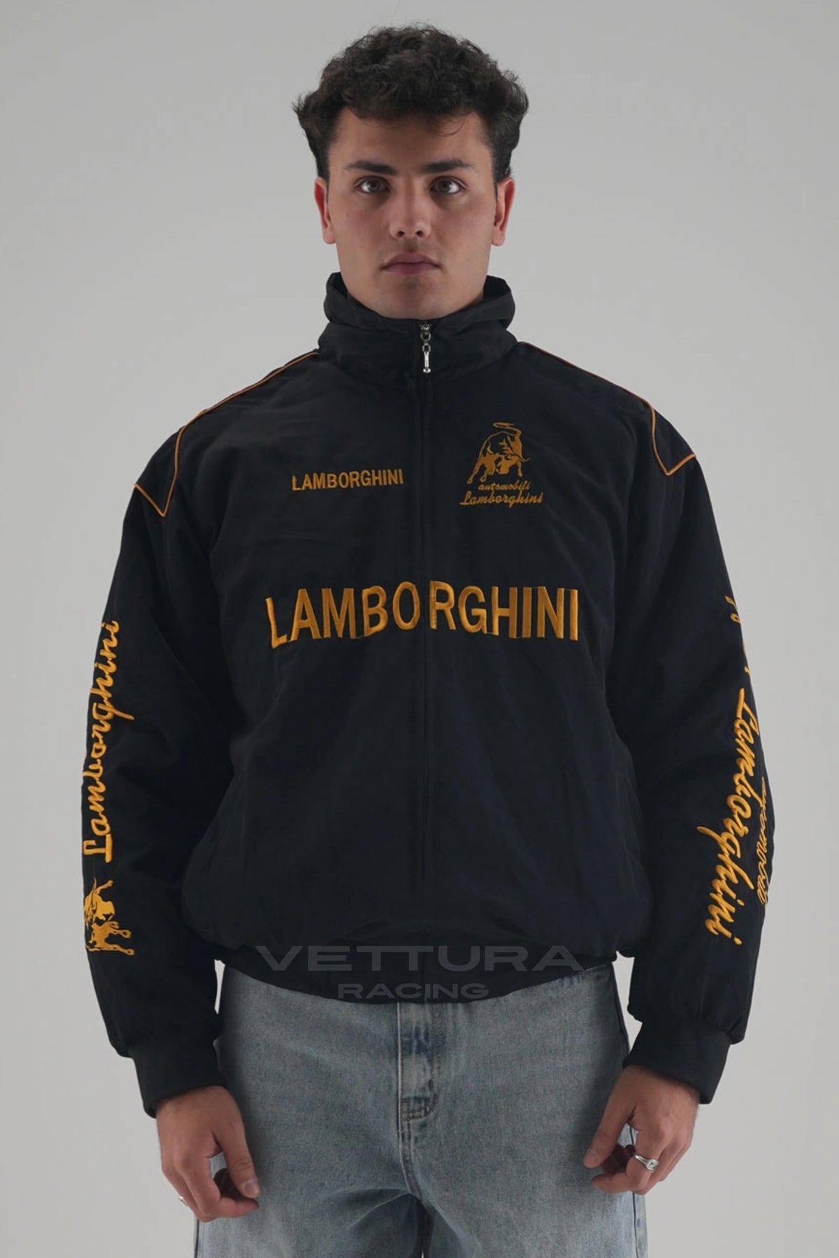 Model wearing the black Lamborghini vintage racing jacket, front view