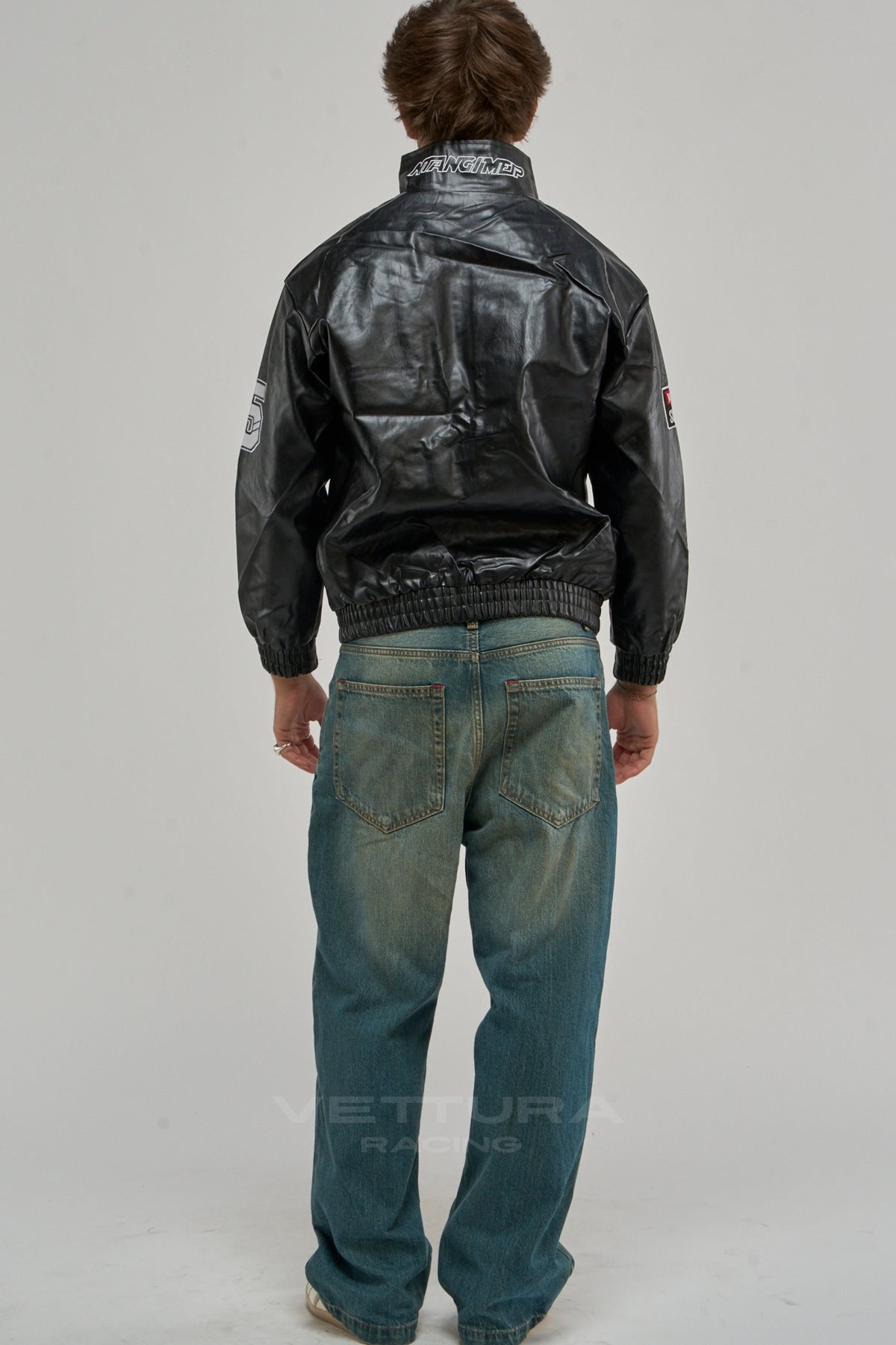 LAP 85 black racing jacket worn on the street