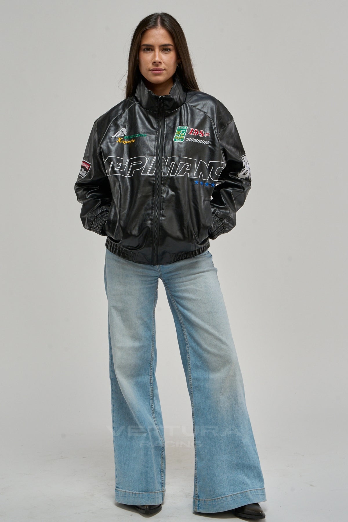 Model wearing the LAP 85 black racing bomber jacket, front view