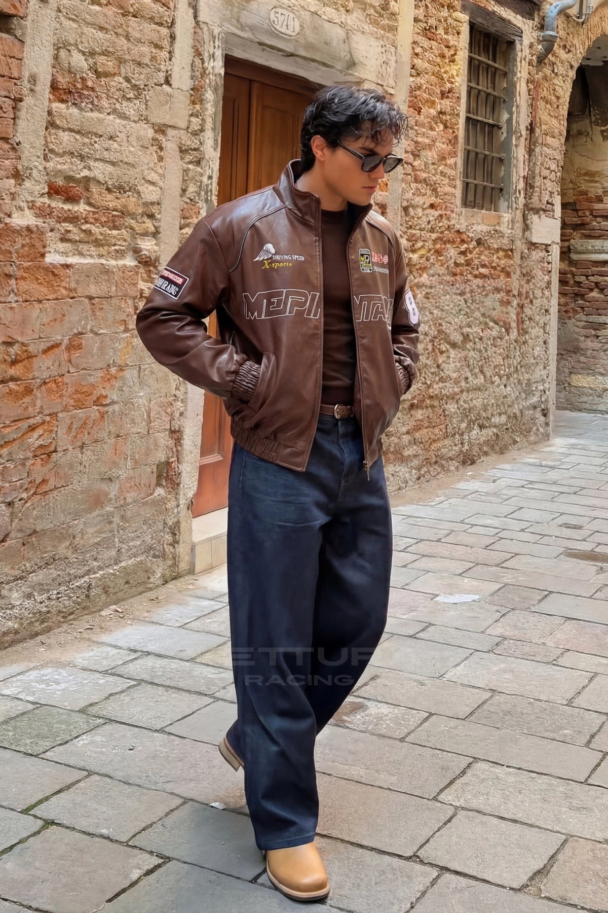 Close view of the chest wordmark on the LAP 85 brown jacket