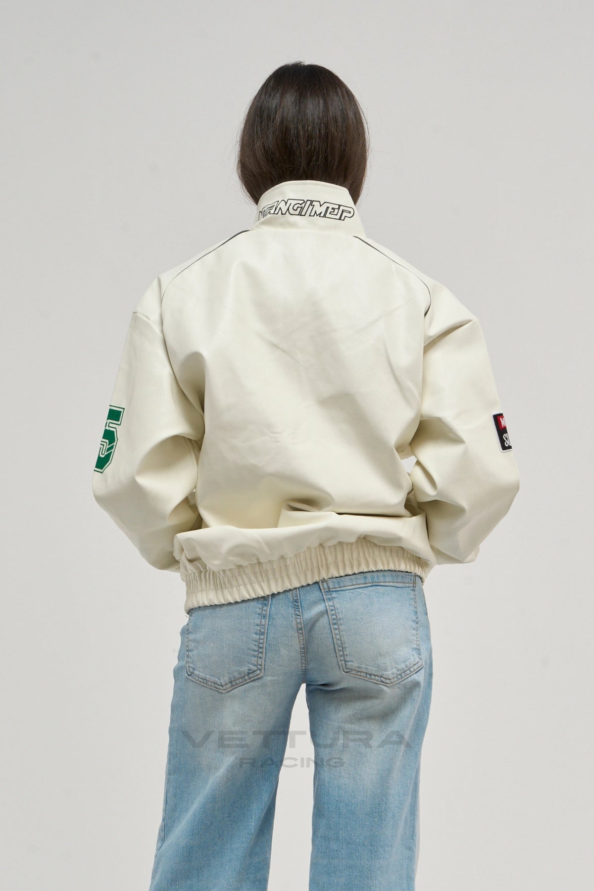 Model wearing the LAP 85 white racing bomber jacket, front view