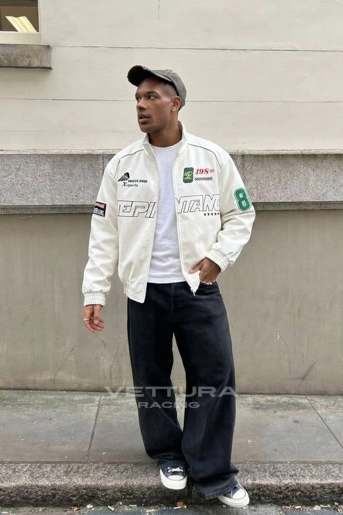 Close view of the chest wordmark on the LAP 85 white jacket